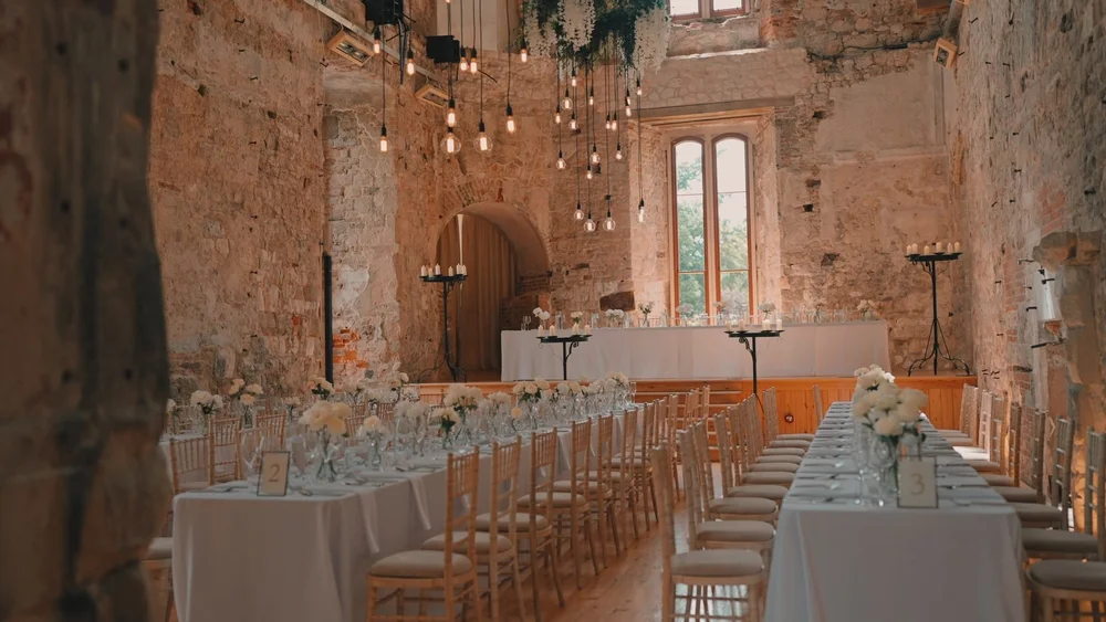 A ceremony set up at Lulworth Castle, filmed by Spice Wedding Films