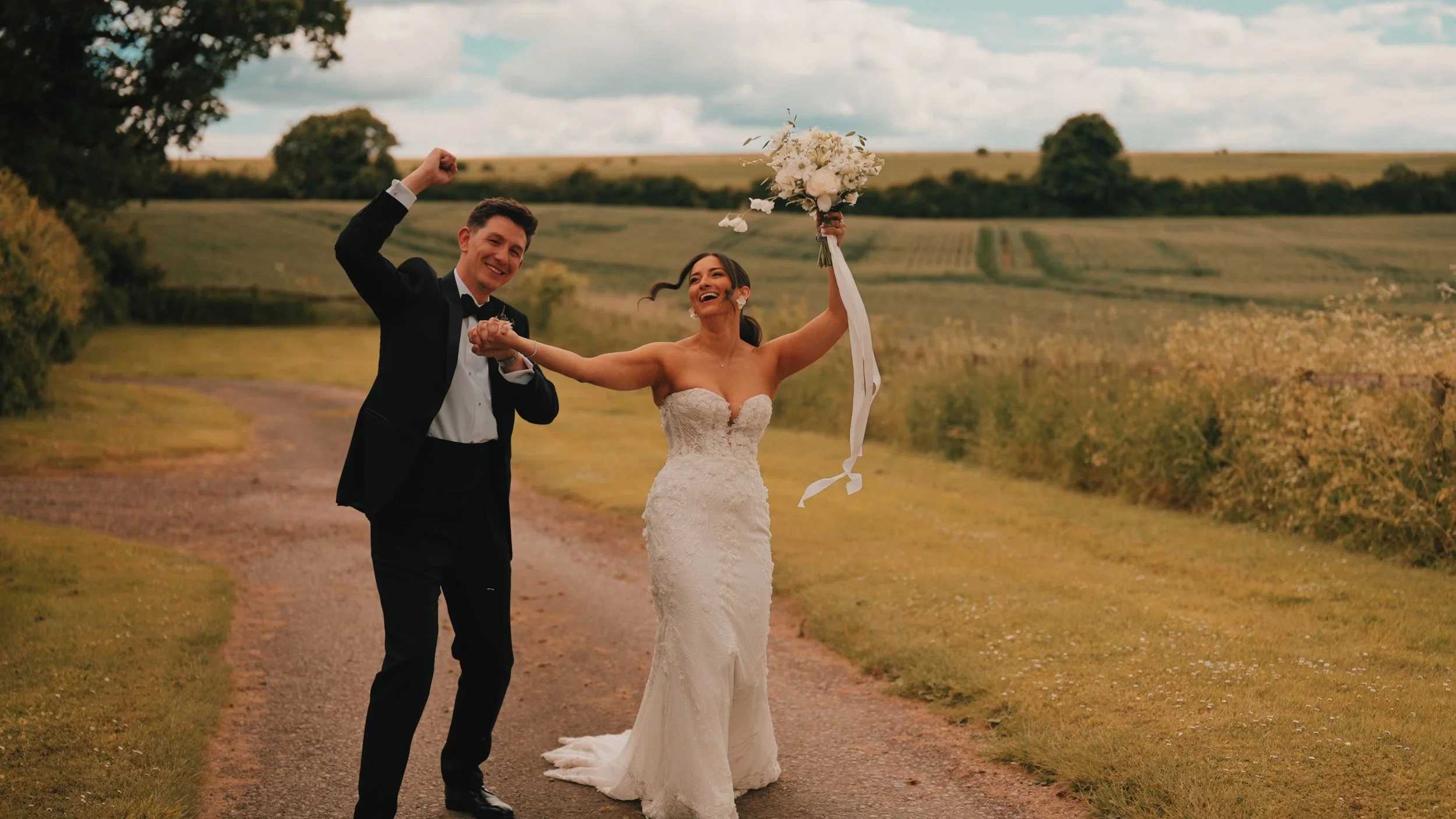Wedding couple at Clock Barn wedding venue in Hampshire, photo by Spice Wedding Films