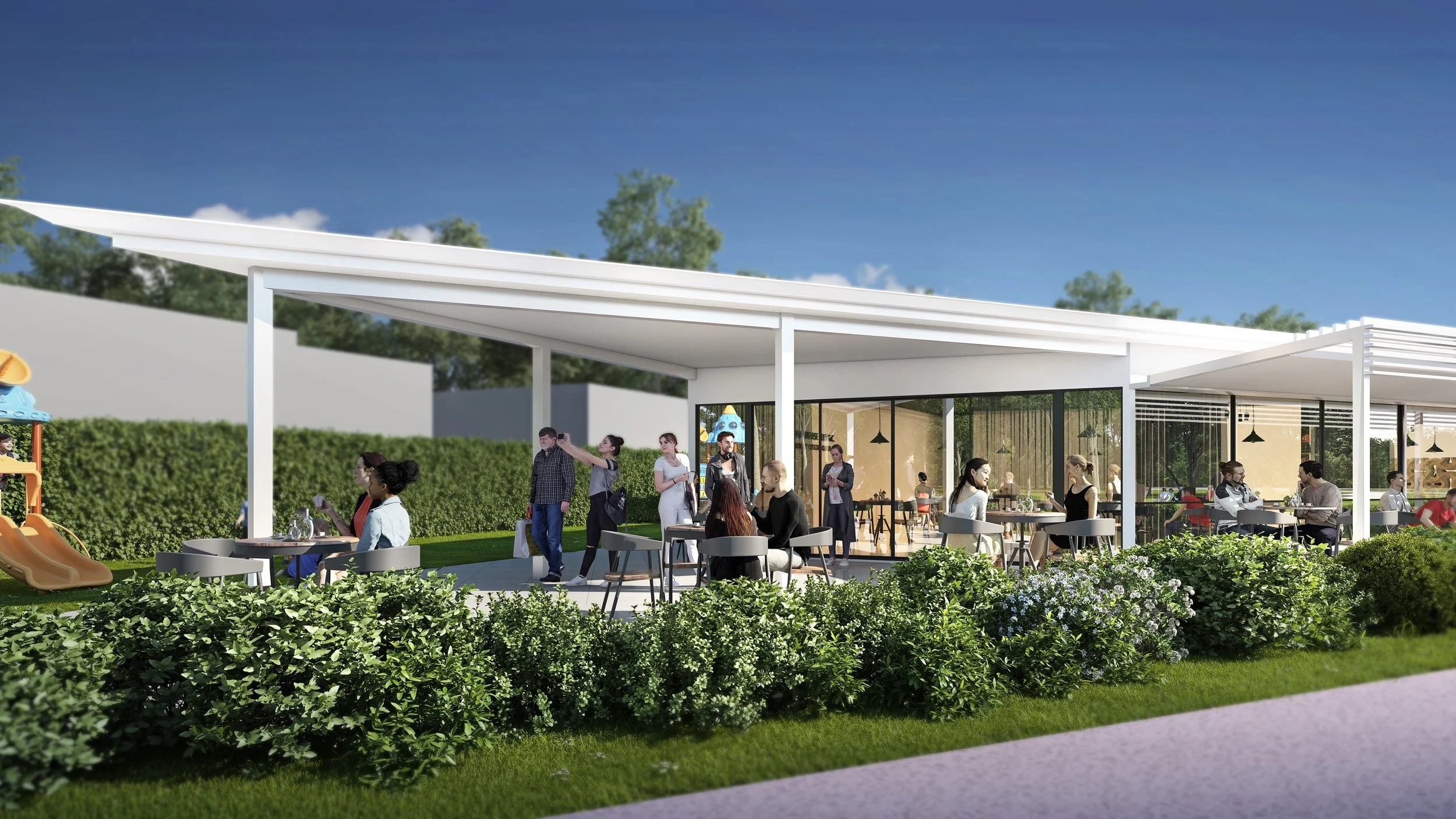 Outdoor restaurant with tables and chairs, people dining and socializing, greenery, and a playground in the background.
