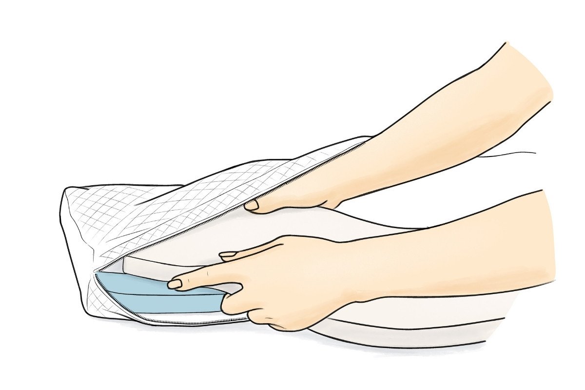 Person swopping layers in an under pillow to customise height or feel