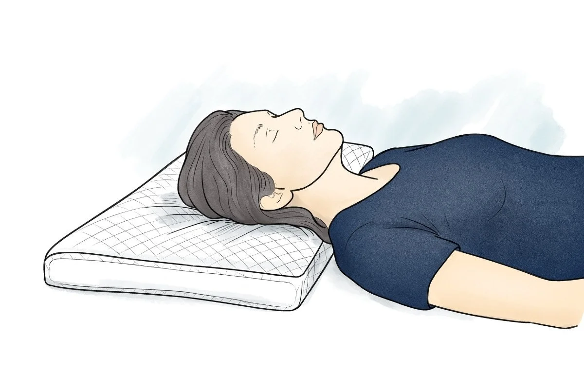 Person resting on their back on a pillow
