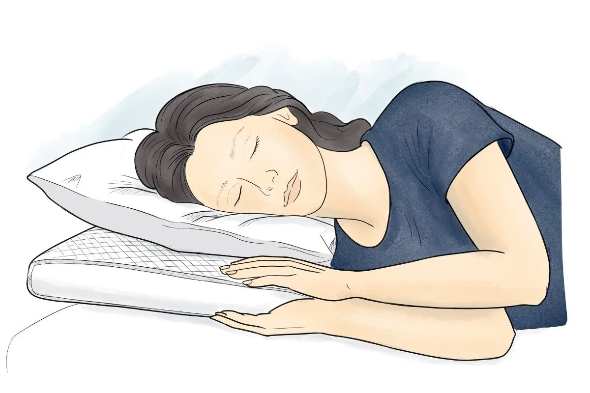 Person sleeping on their side with their head, neck and spine in good alignment
