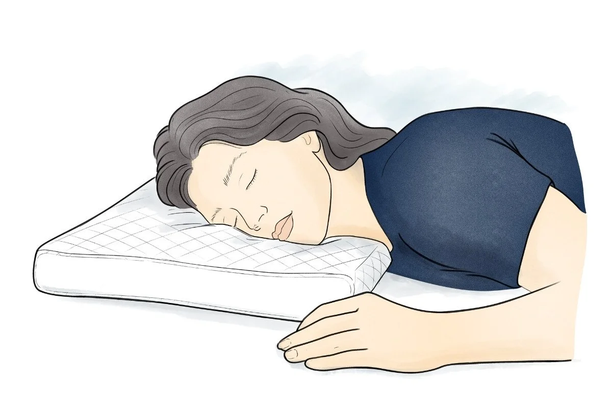 Person sleeping on their front on an adjustable pillow