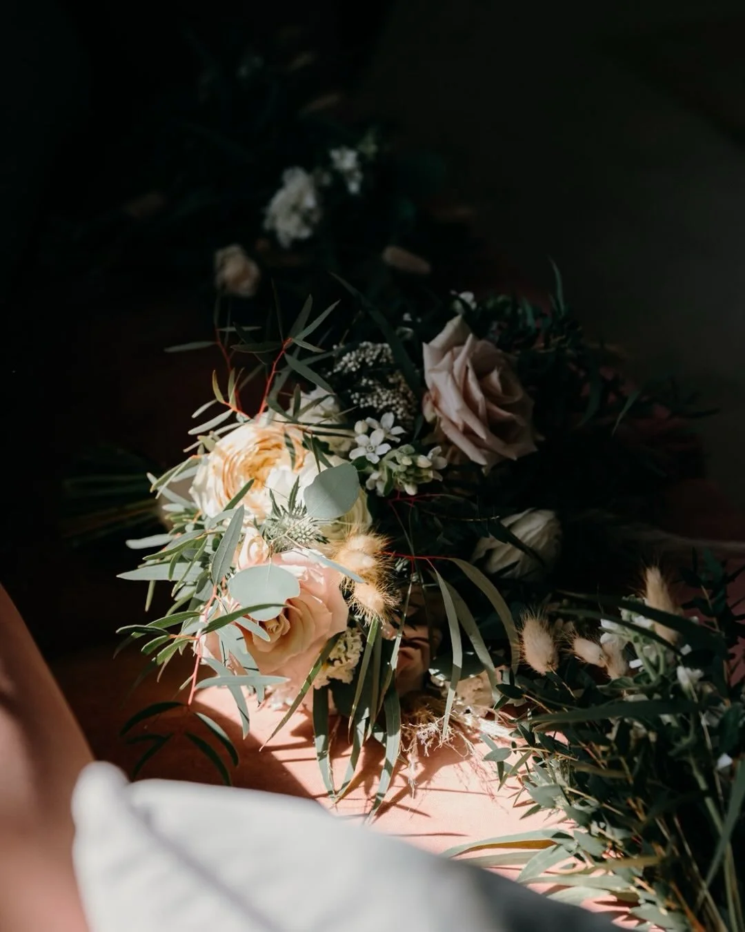 One little tip we have learnt over the last few years is to make sure you get your bouquets out of their water a while before you&rsquo;re planning on holding them. That way, they have a little time to dry off and don&rsquo;t leave wet marks on dress