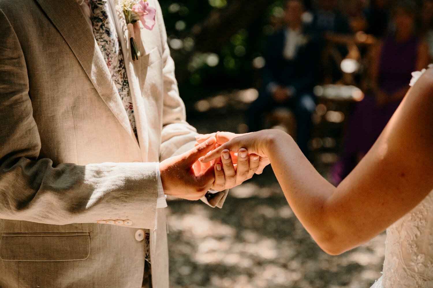Ring detail shot during ceremony, candid wedding photography