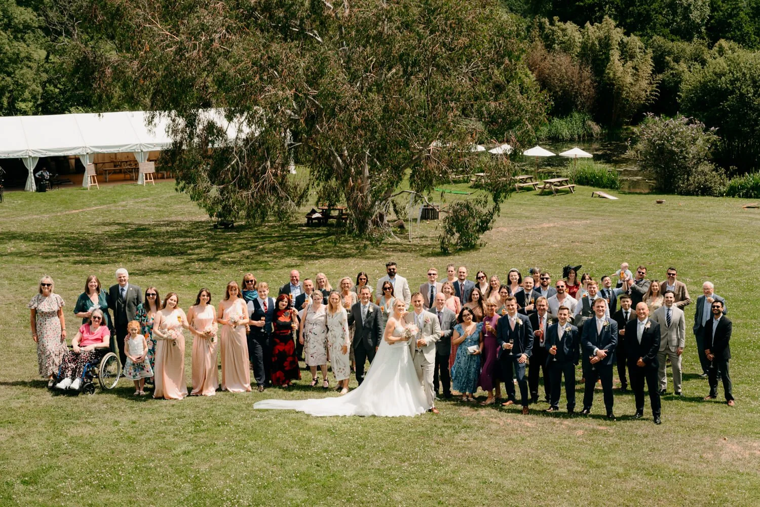Large group photograph of wedding party in Dorset