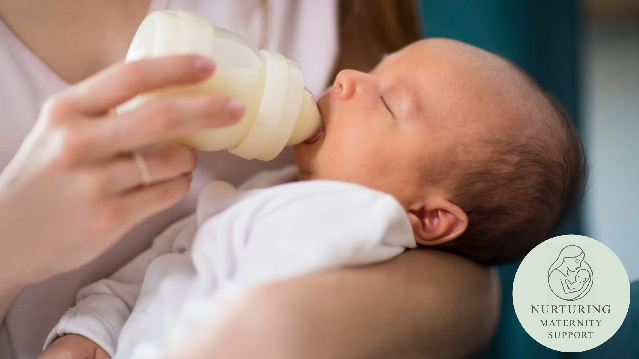 Baby being fed by bottle