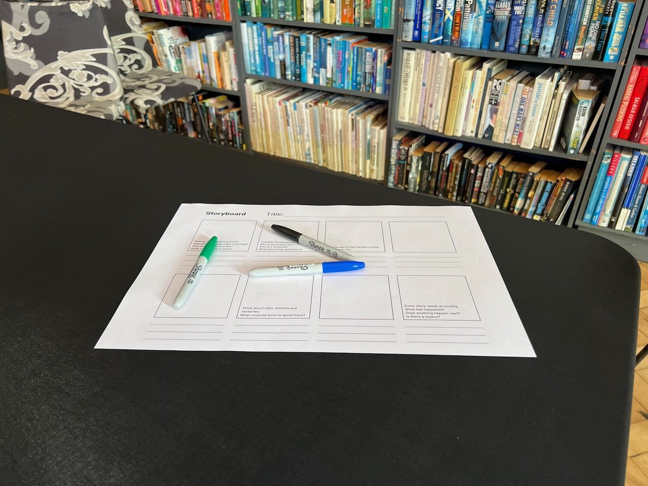 Storyboard template with pens in a library