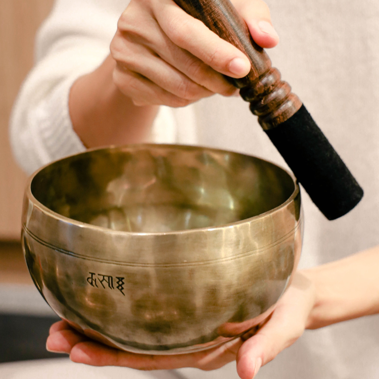 Private sound therapy session with singing bowls at Soma Haus Singapore