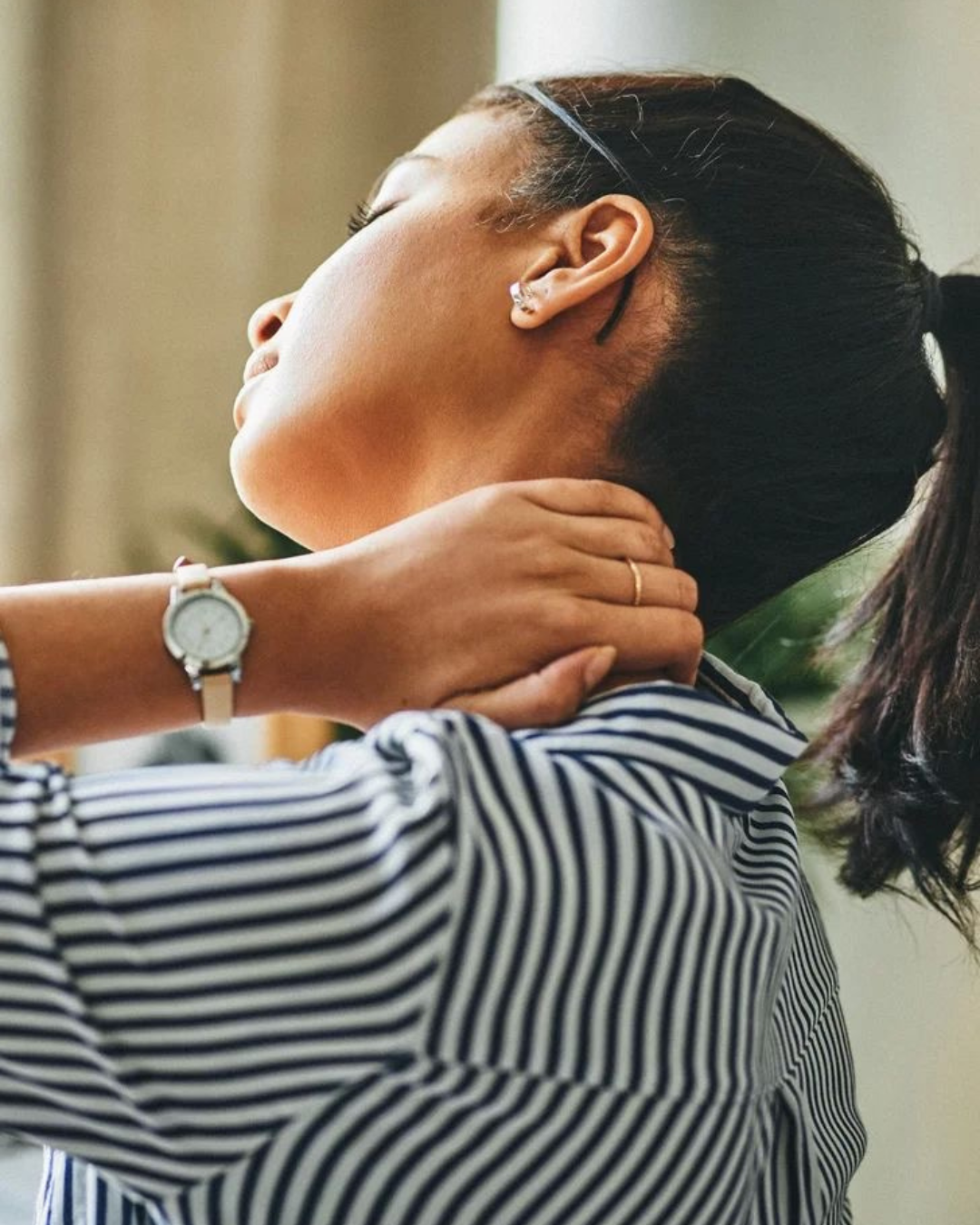 Corporate wellness program teaching chair yoga and myofascial release for desk tension