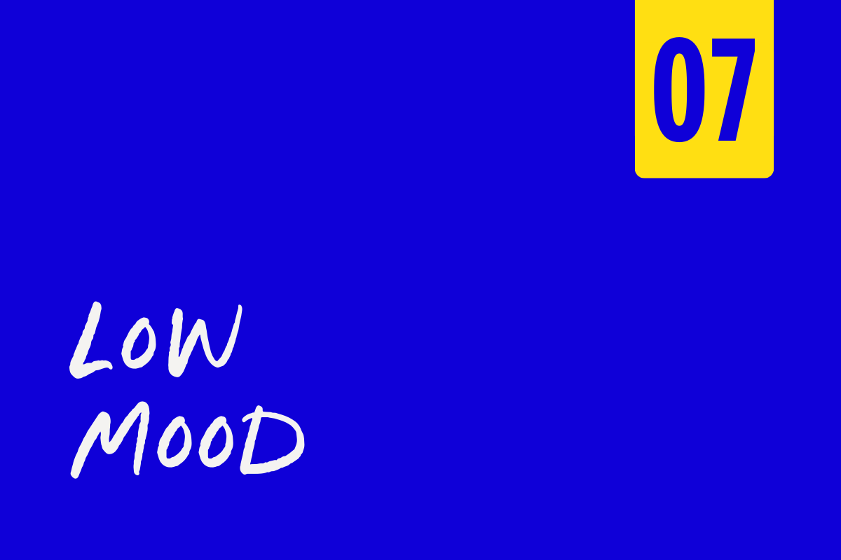 Blue book cover with yellow tab in the top right corner showing '07' and white handwritten text 'Low Mood' on the cover.