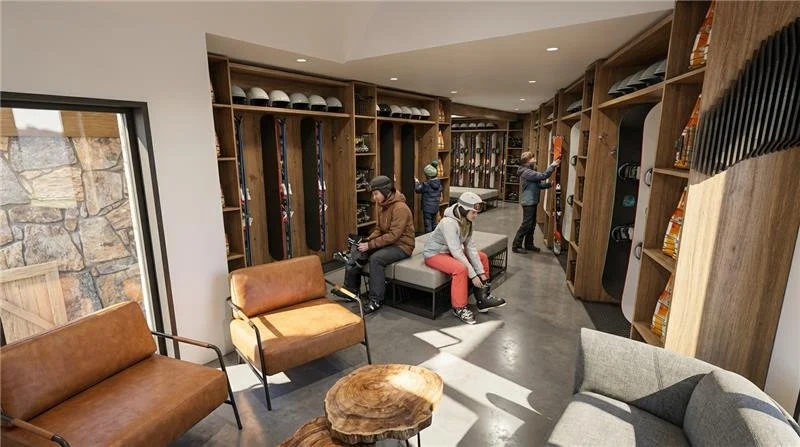 A ski storage lounge with helmets, skis, and snowboards on shelves.