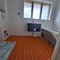 before and after underfloor heating with ditra matting tiling Bursledon