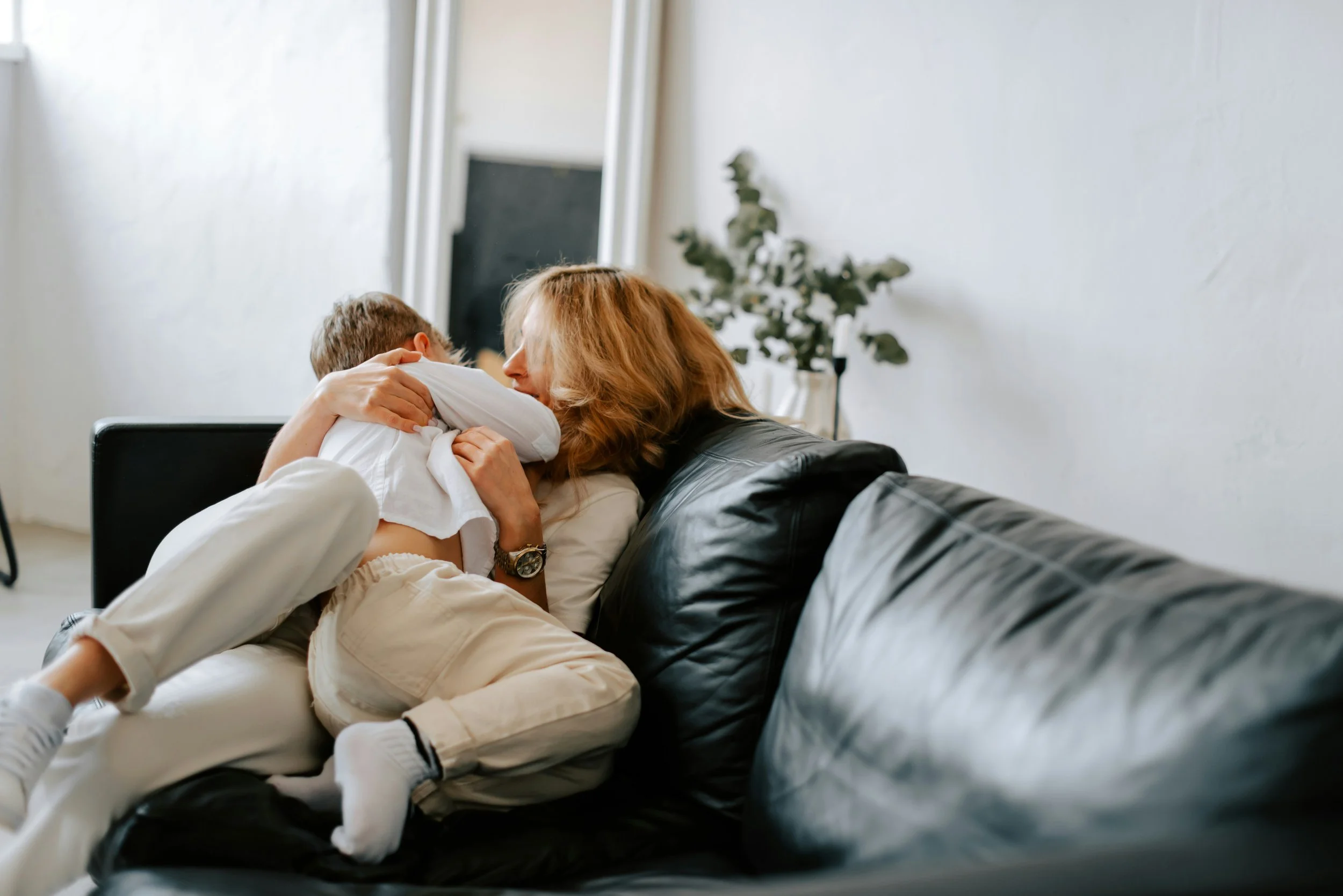 Mother and son sharing a tender moment during Parent-Child Interaction Therapy