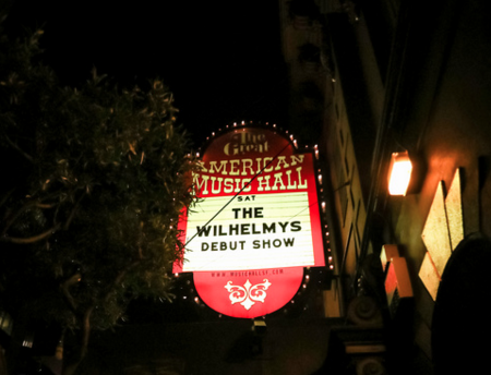 Sign for The Great American Music Hall showing The Wilhelmys debut show at night.