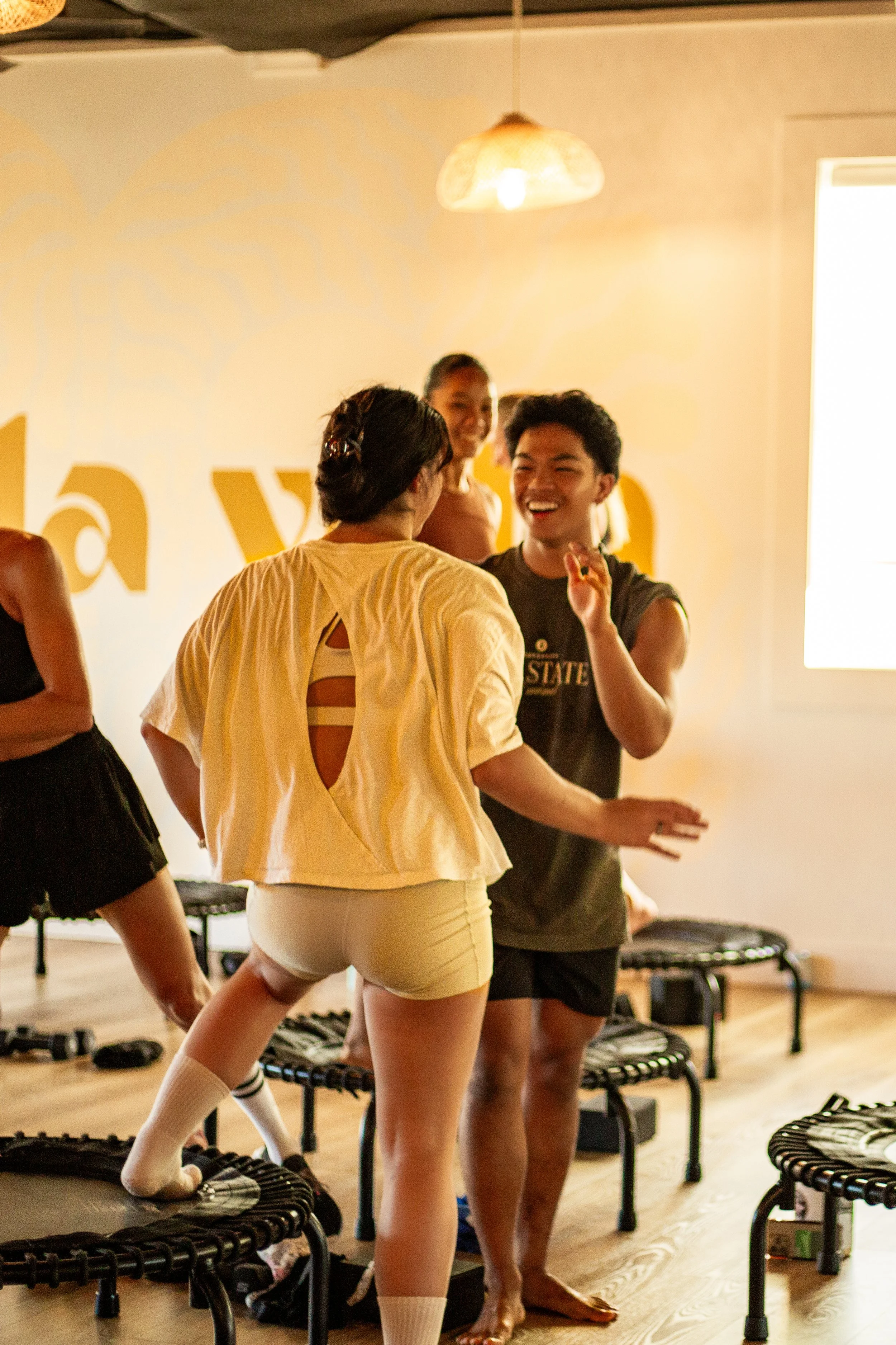 high five in fitness class