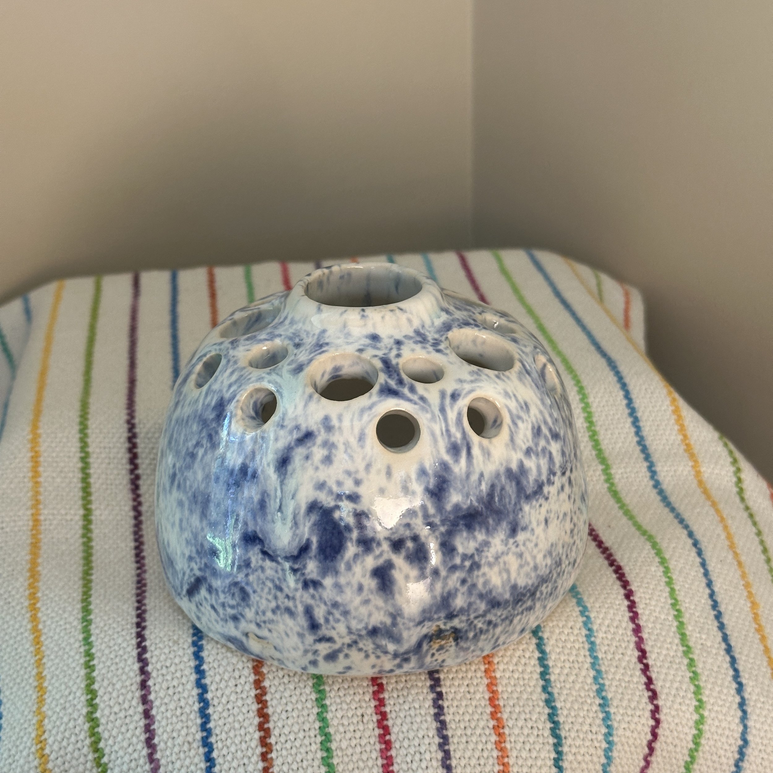 Small speckled blue vase side