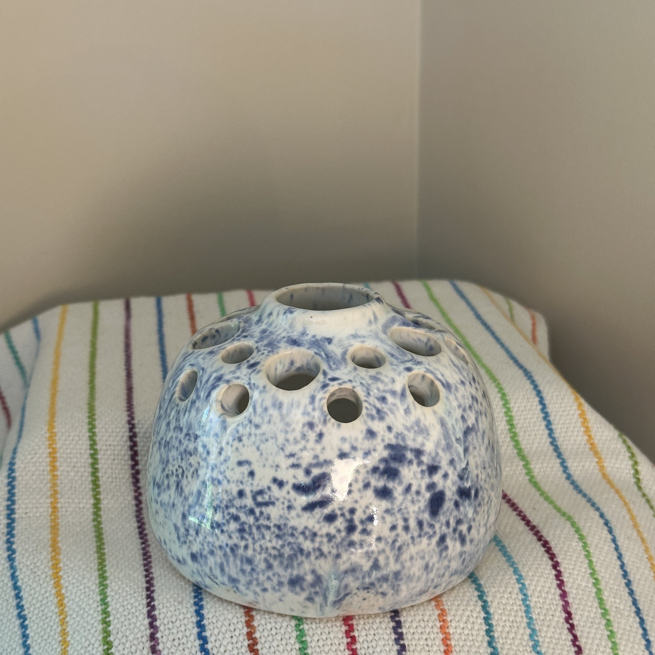 Small speckled blue vase side