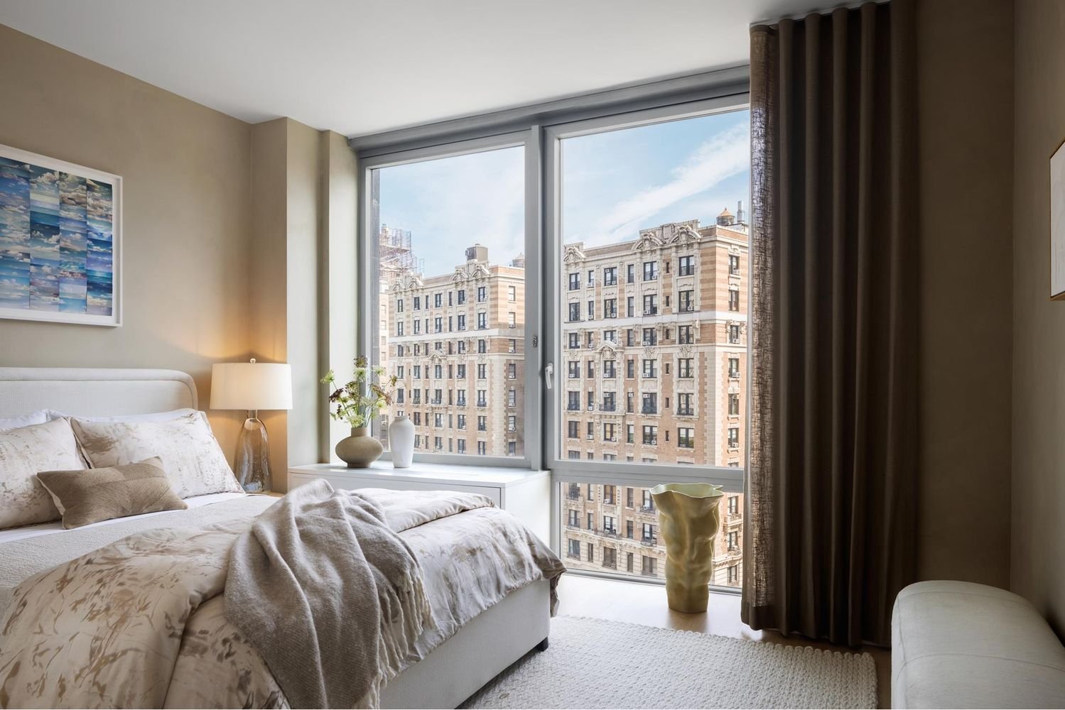 Detail of limewashed corner wall in NYC guest room