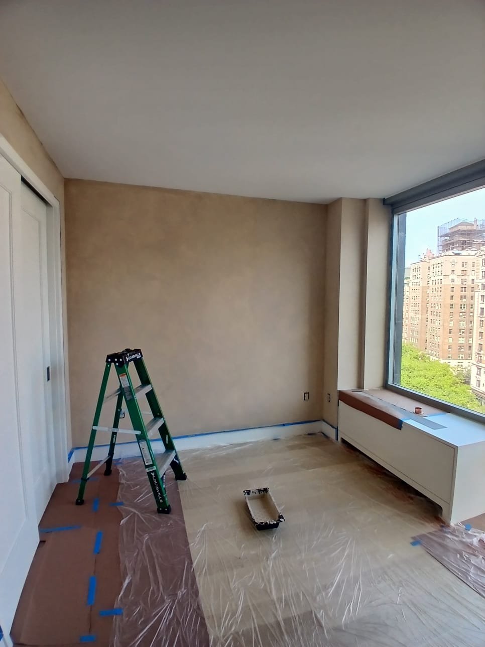 White wall before limewash application in Upper West Side residence
