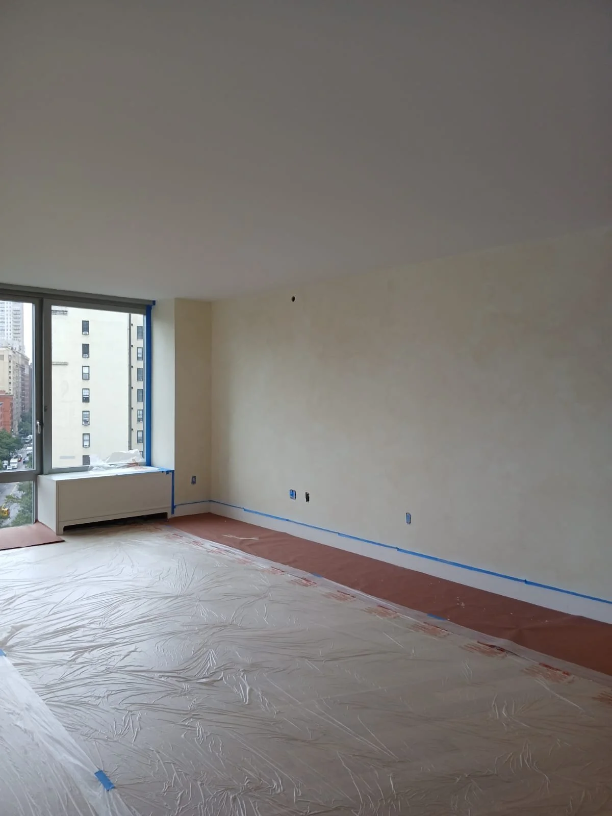 Limewash in progress showing depth and texture build-up