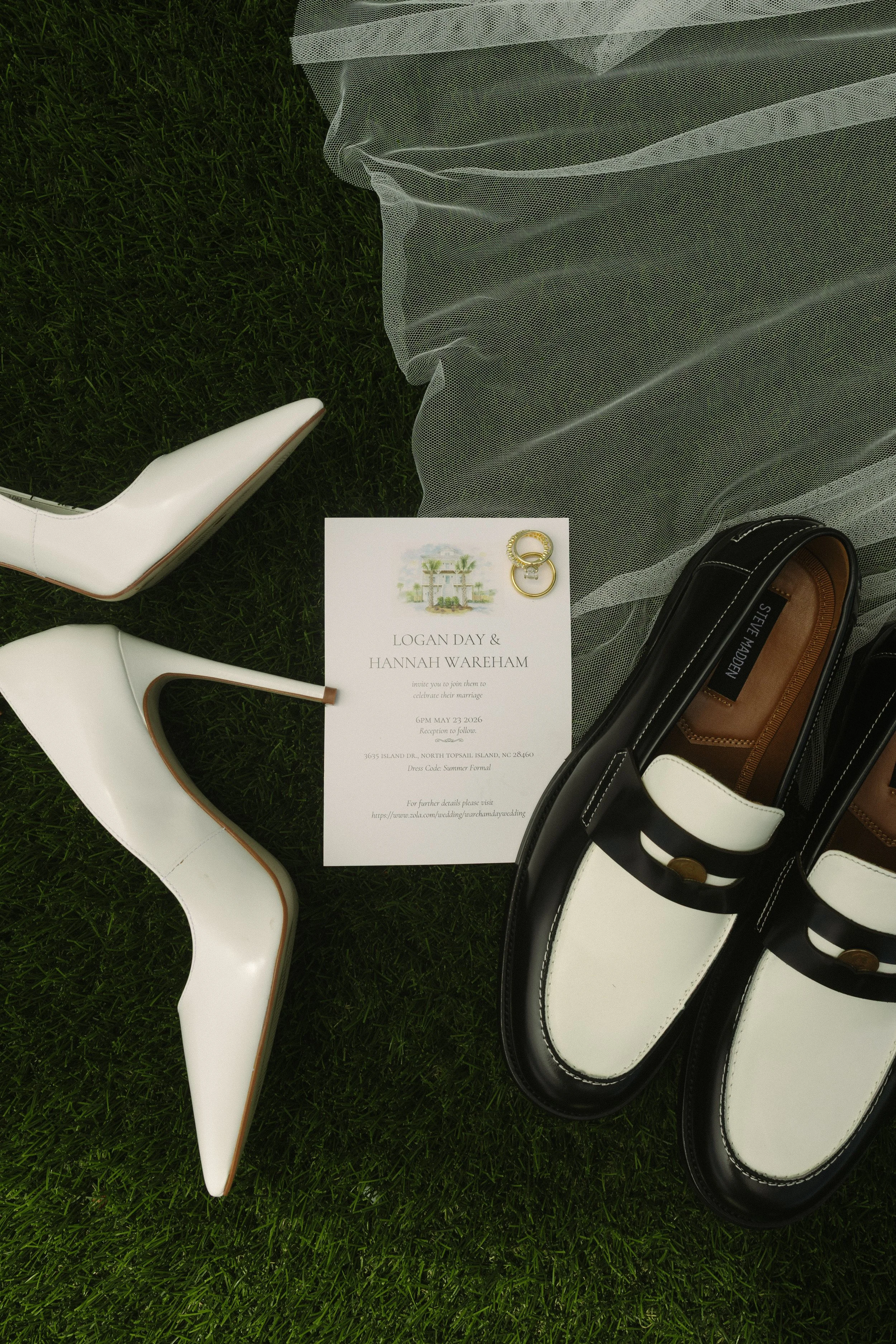 Wedding invitation card for Logan Day and Hannah Wareham, with rings image, white high-heeled shoes, black and white footwear, sheer fabric, and grass background.