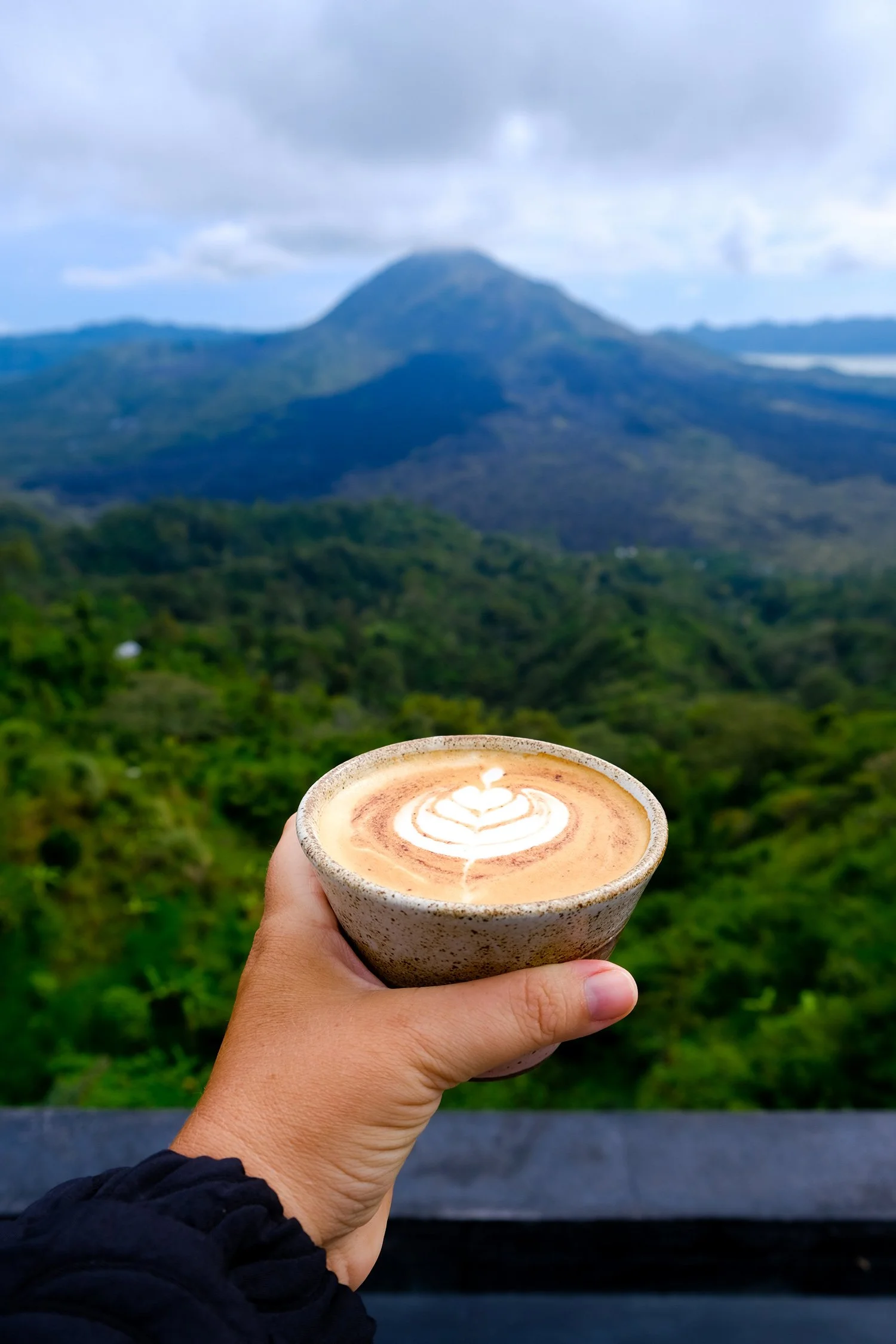 woman-is-holding-ceramic-cup-of-cappuccino-with-am-2025-02-21-13-22-39-utc.jpg