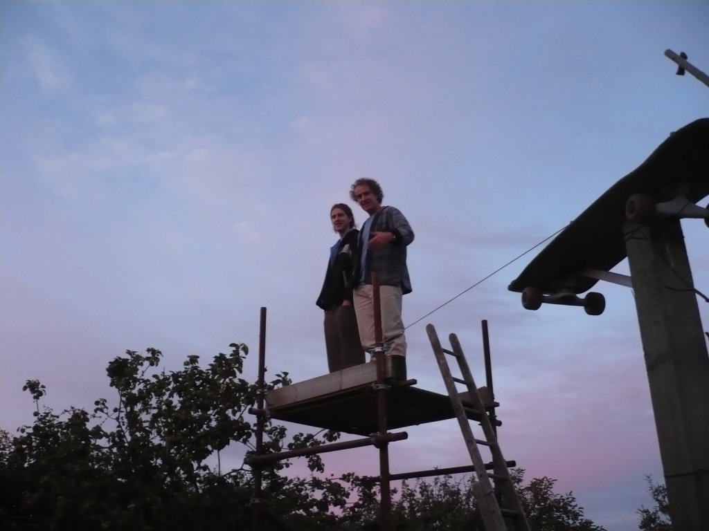 Arthur and Matthew 2009 on one of three scaffolding towers he built in the garden. This one was high enough to create the means of photographing his 22' wide paintings.