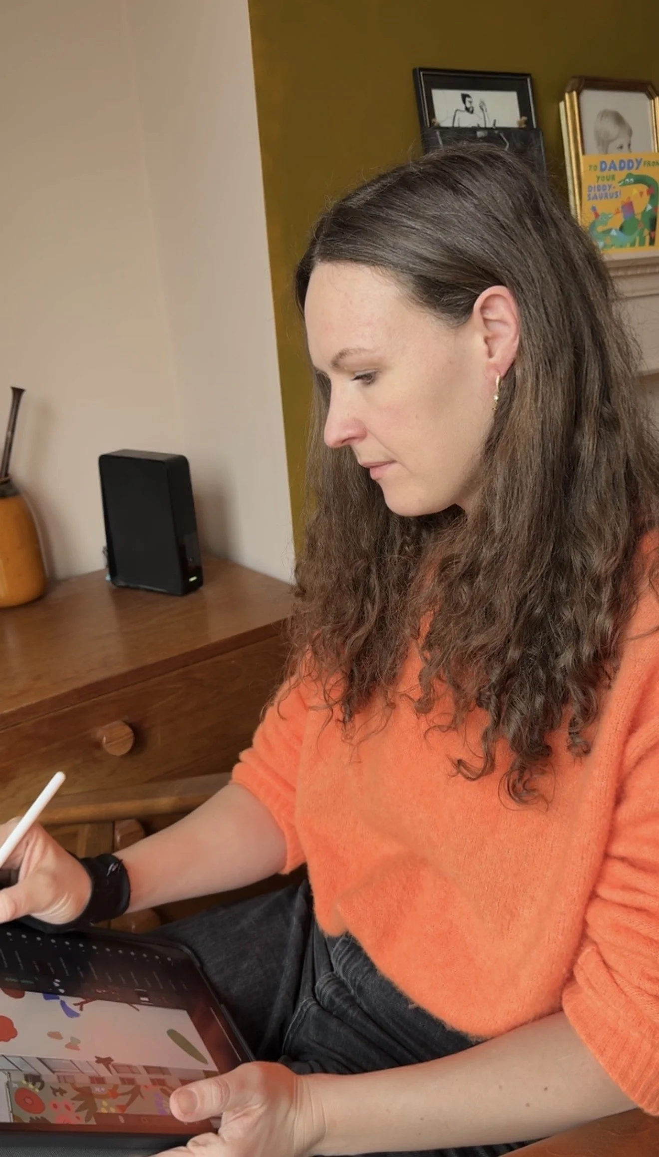 Emily Kaye developing an illustration on an iPad