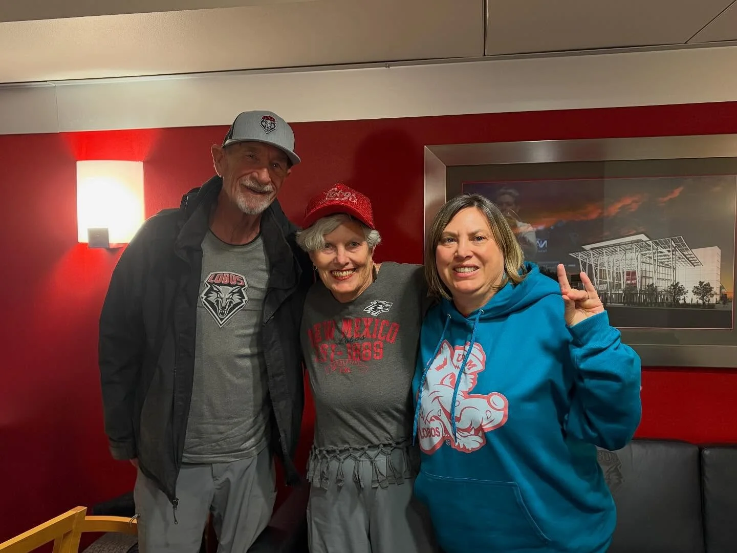 Some amazing Lobo fans looking 🔥 in some of our creations at the game tonight! #golobos