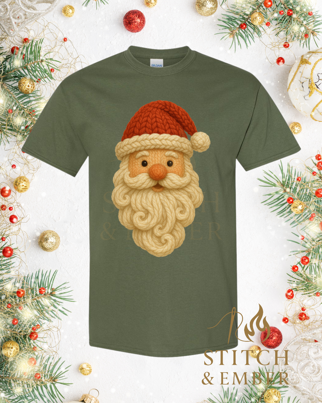 Green T-shirt with a faux knitted Santa Claus face design featuring a red hat, white beard, and big nose, surrounded by Christmas decorations including pine branches, red and gold ornaments, and glittery decorations.