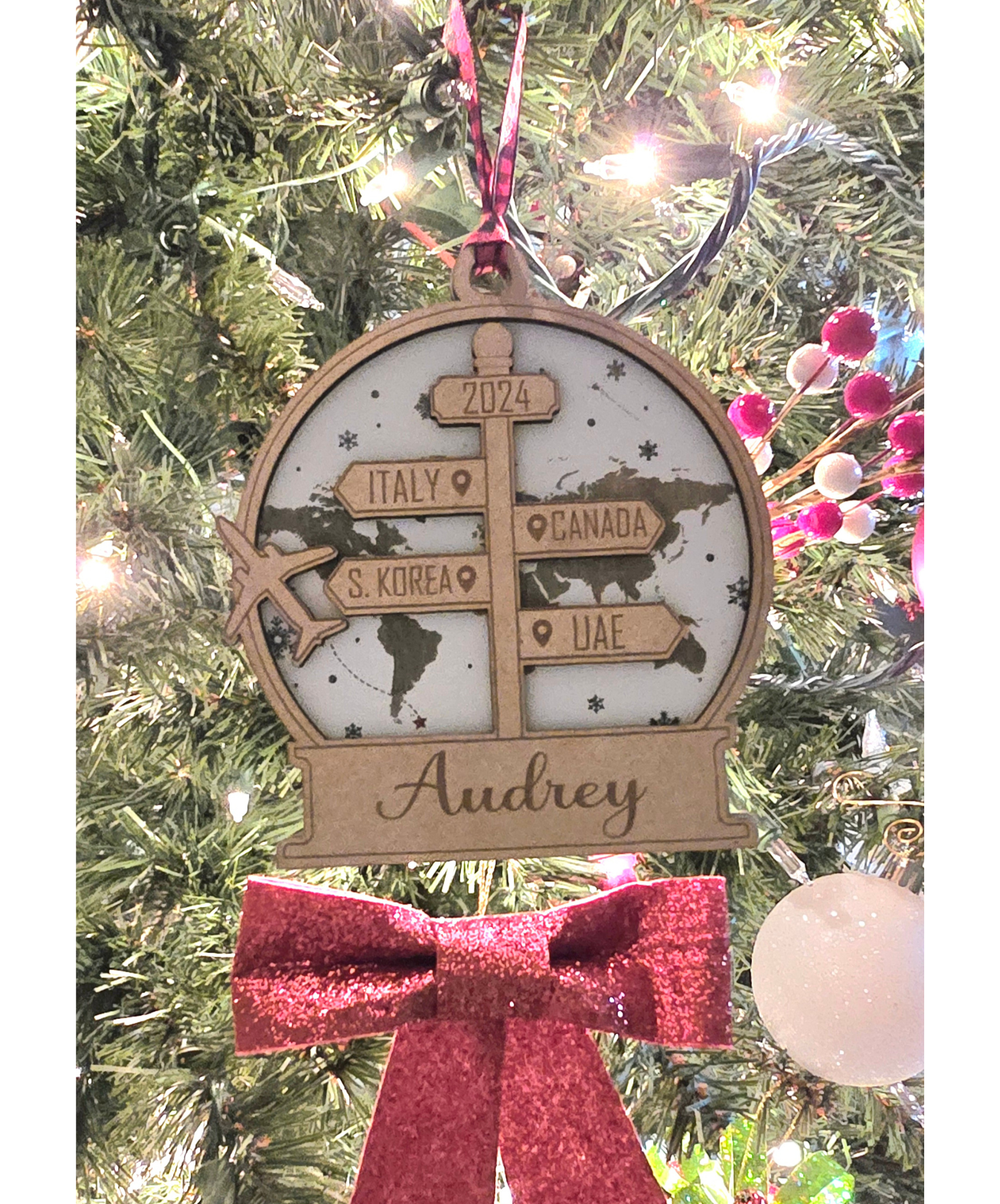 Personalized Travel-Themed Christmas Ornament – Custom Laser Engraved Wooden Keepsake with Name and Destinations – 2024 Holiday Gift
