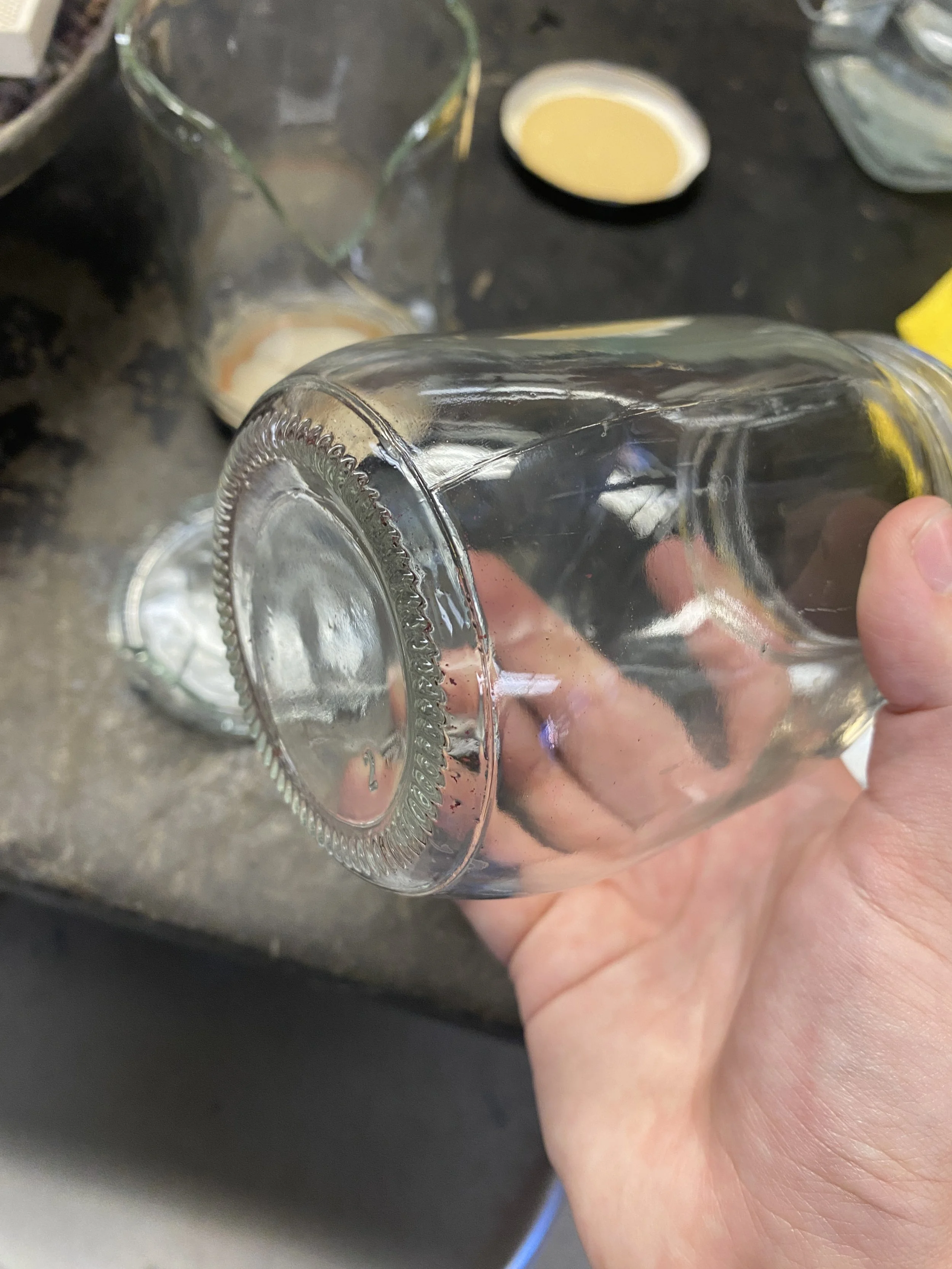 Broken jar that was not tempered. Broke because of frequent quenches of hot metal into boiling water. 