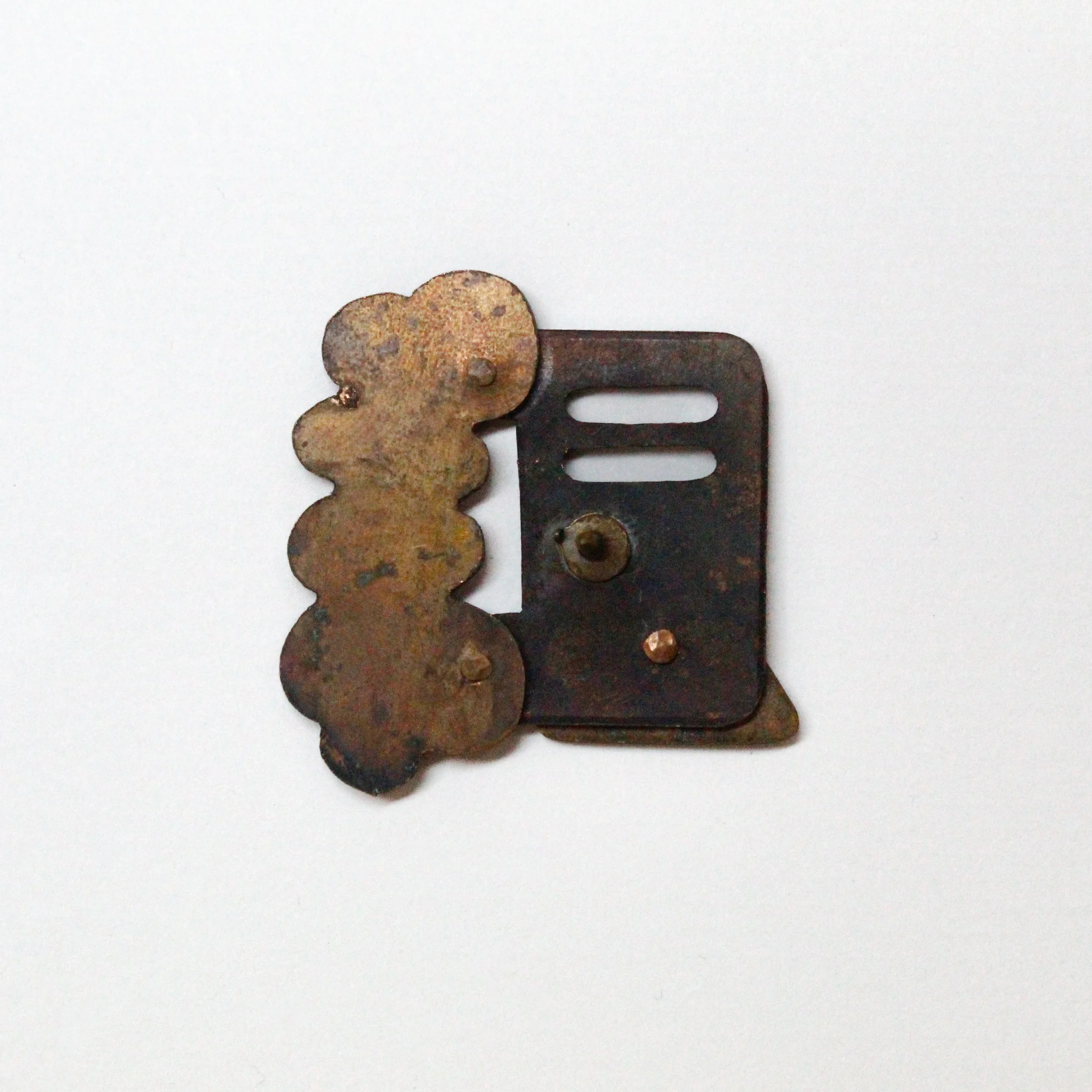 257258260 | copper, assorted immersion patination | 1.375" x 1.375" | 2024 | Back