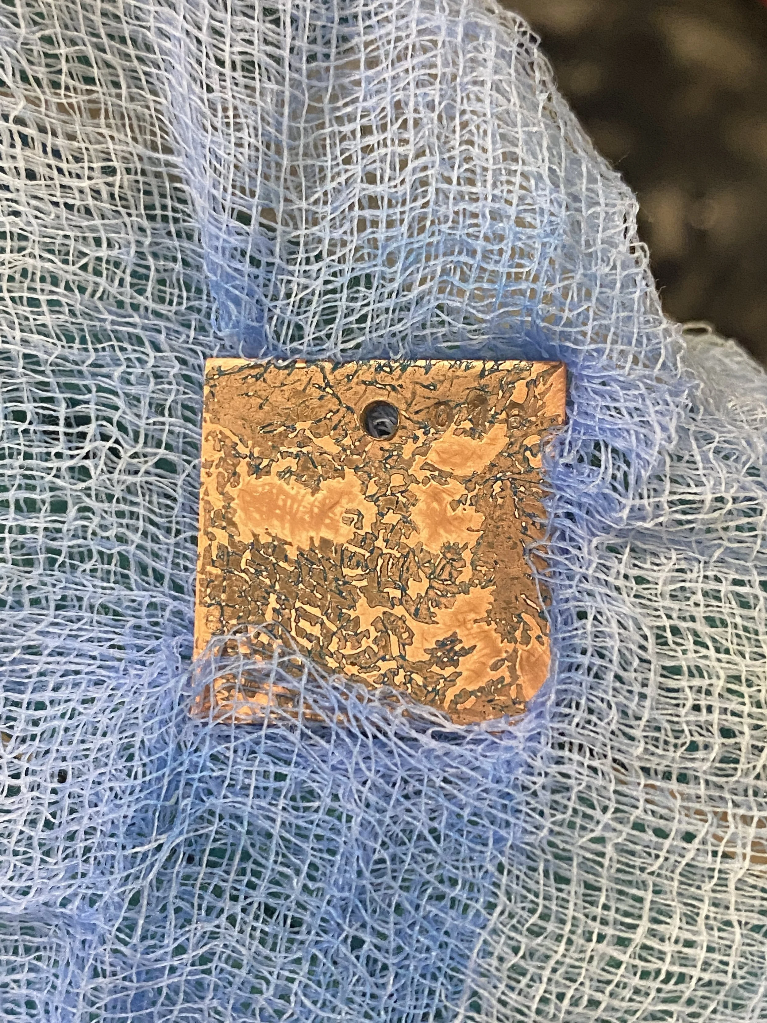 Ammonia and cheesecloth (it's purple)