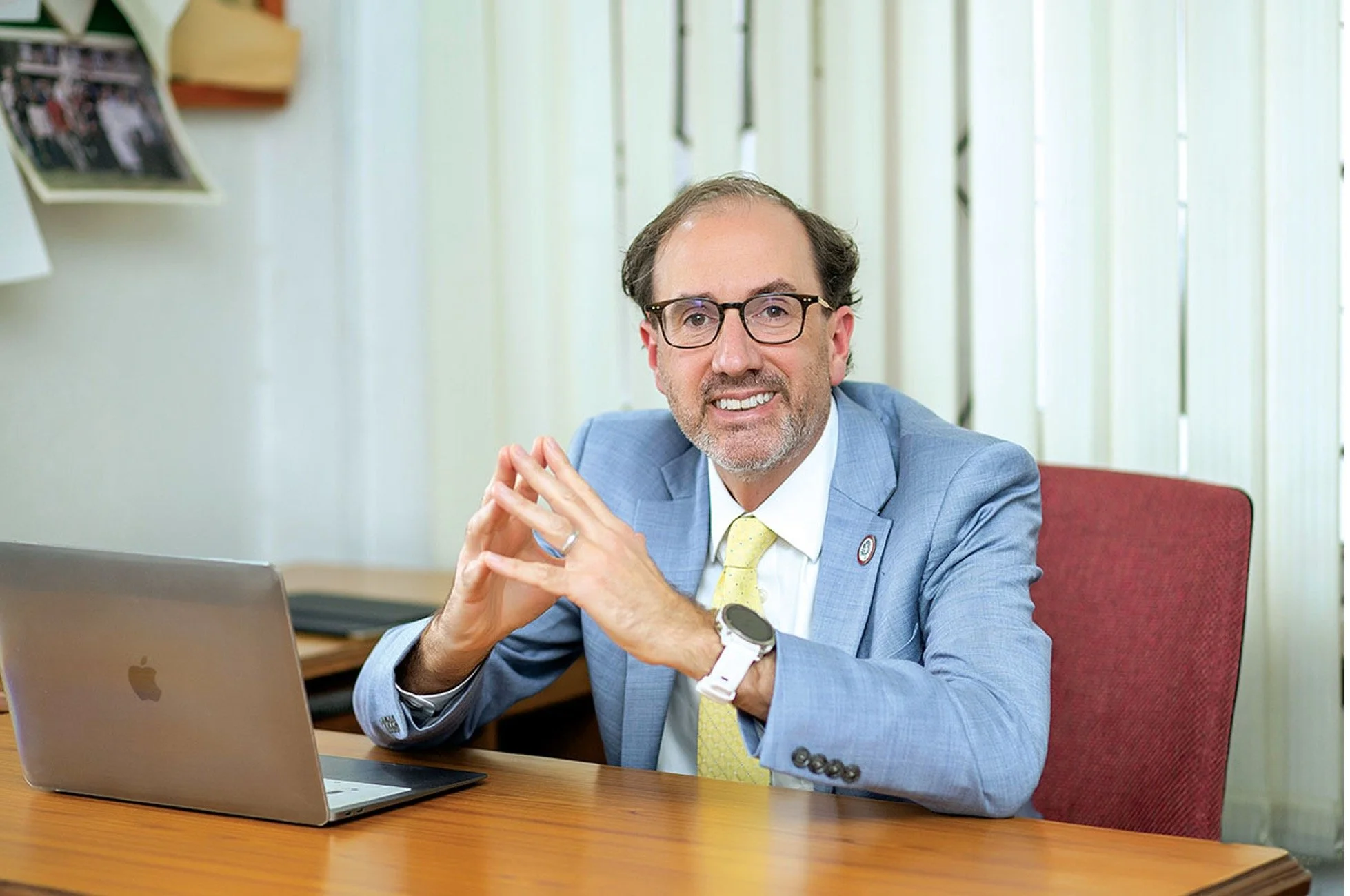 Robert Alt sitting at a desk.
