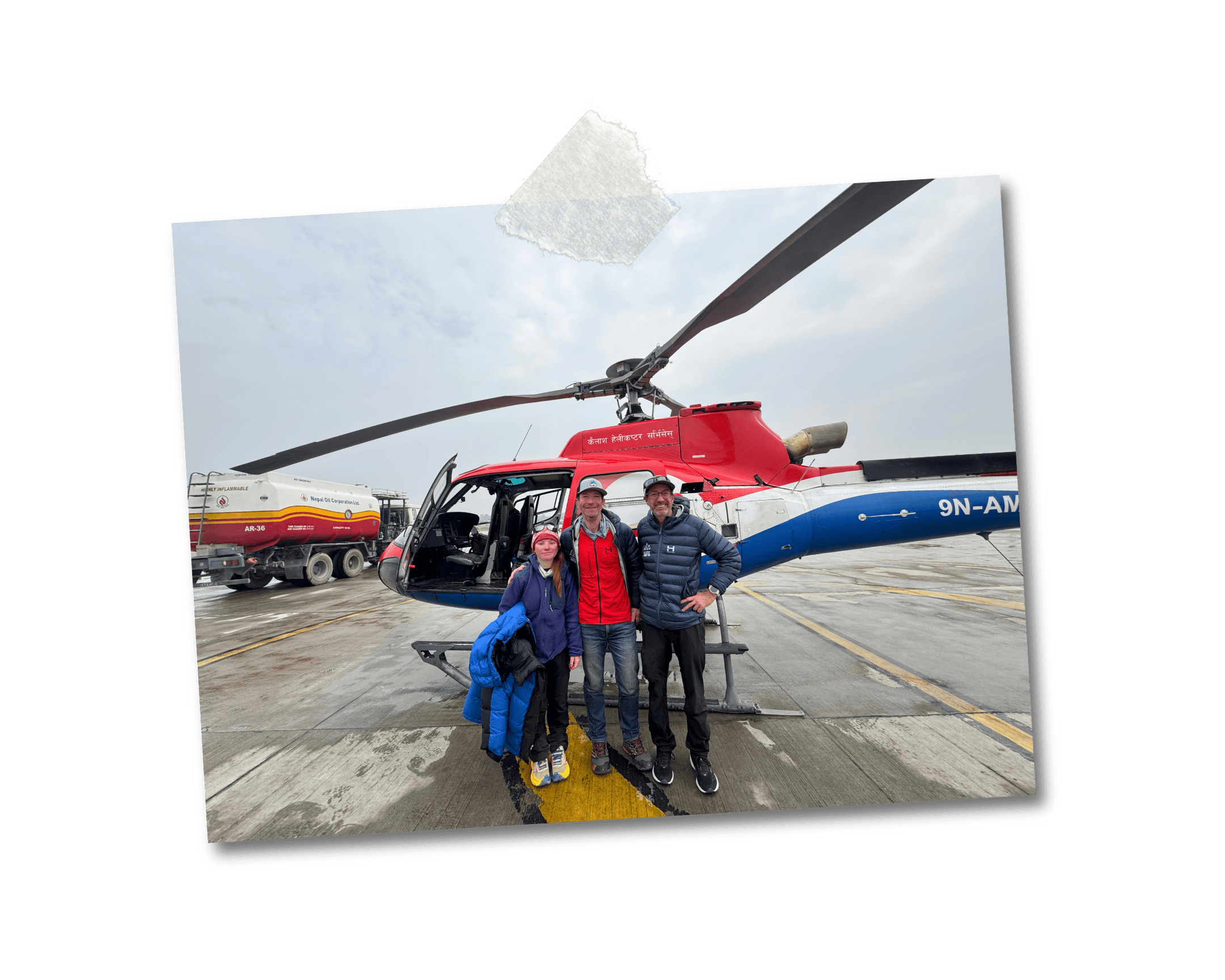 Emma Schwerin (left), Sam Schwerin (middle), and Robert Alt (right) in front of their helicopter before the return to Kathmandu.