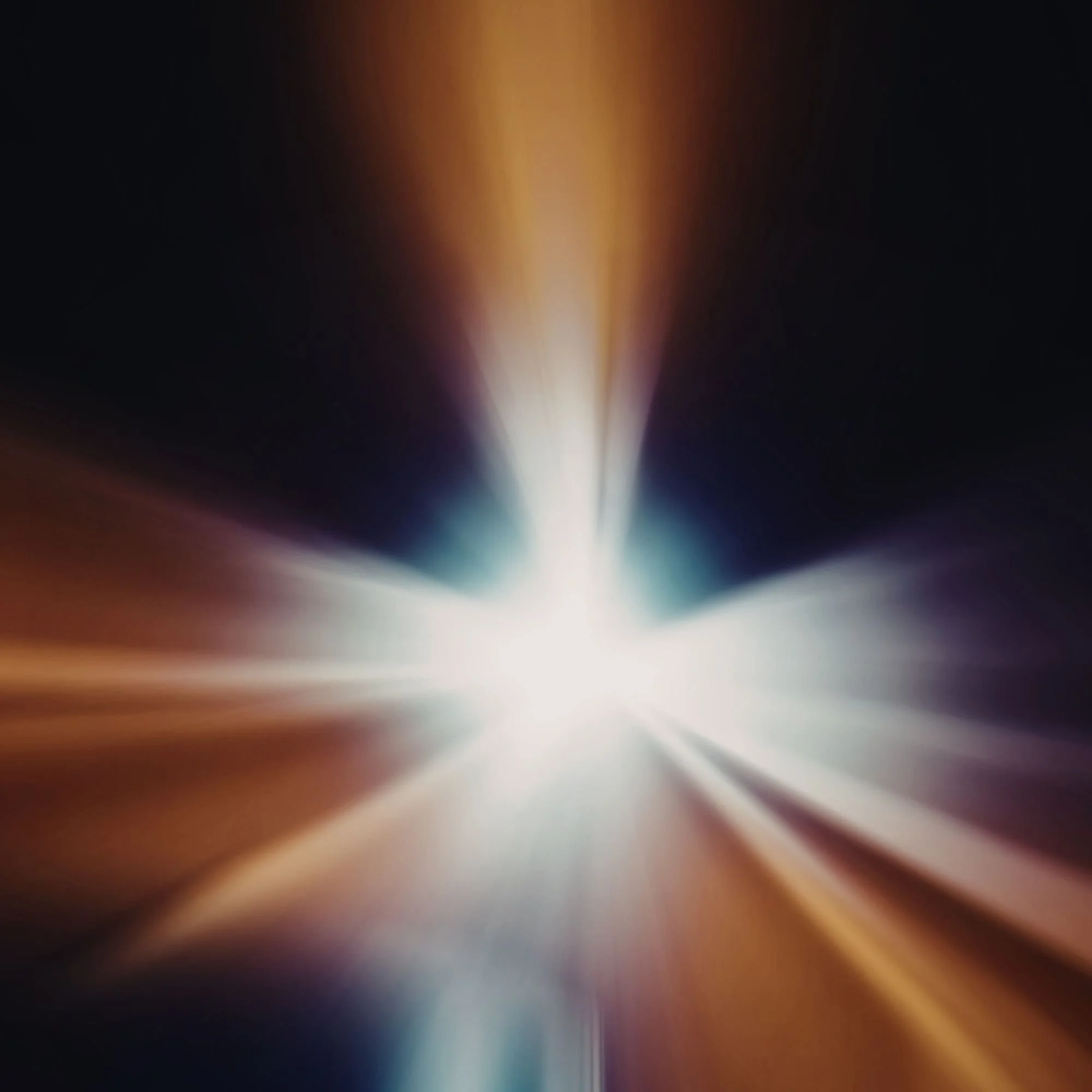 A burst of light with radiant beams in shades of blue, white, and orange against a dark background, creating a sense of energy and movement.