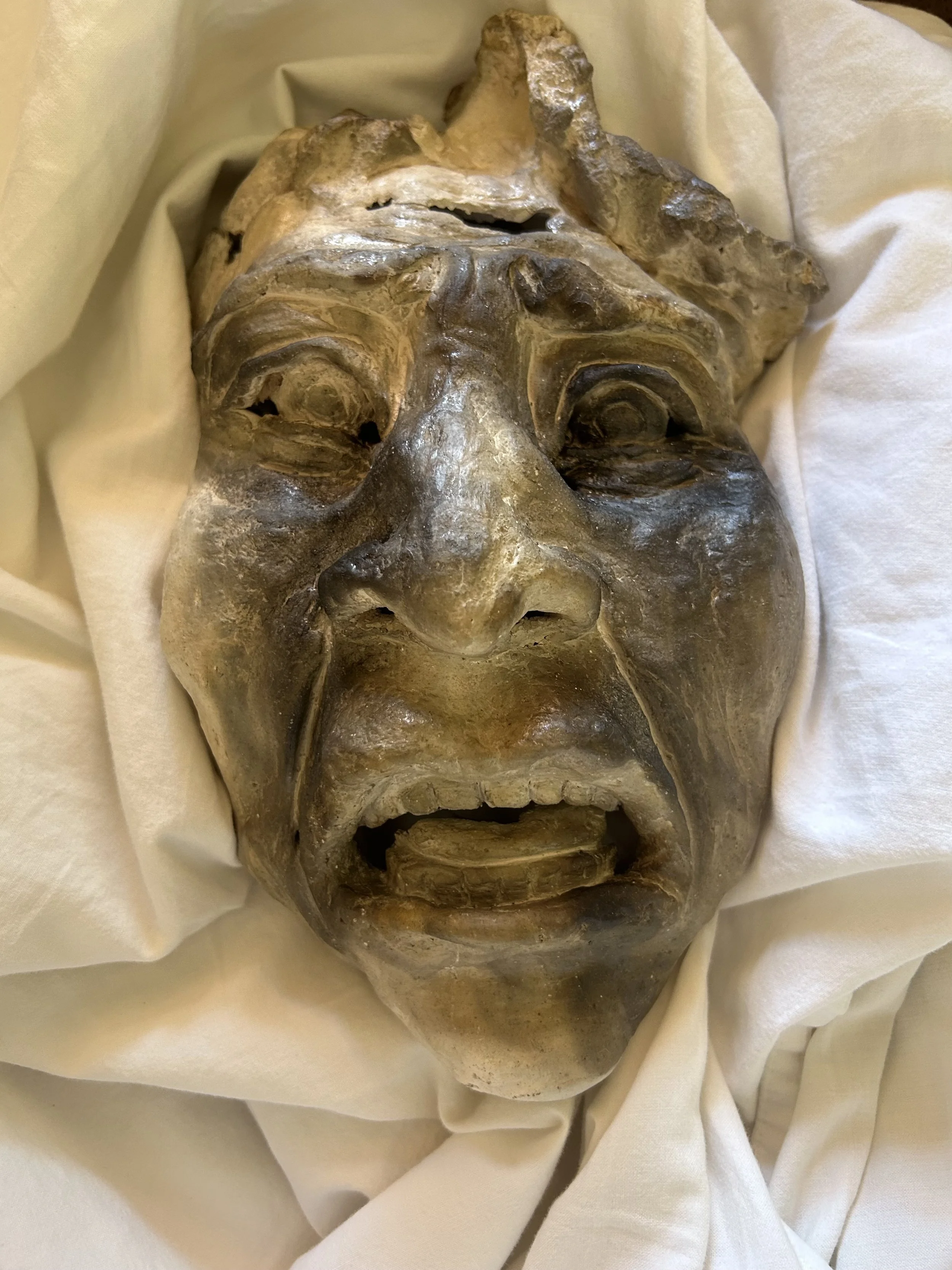 Smoke fired ceramic face