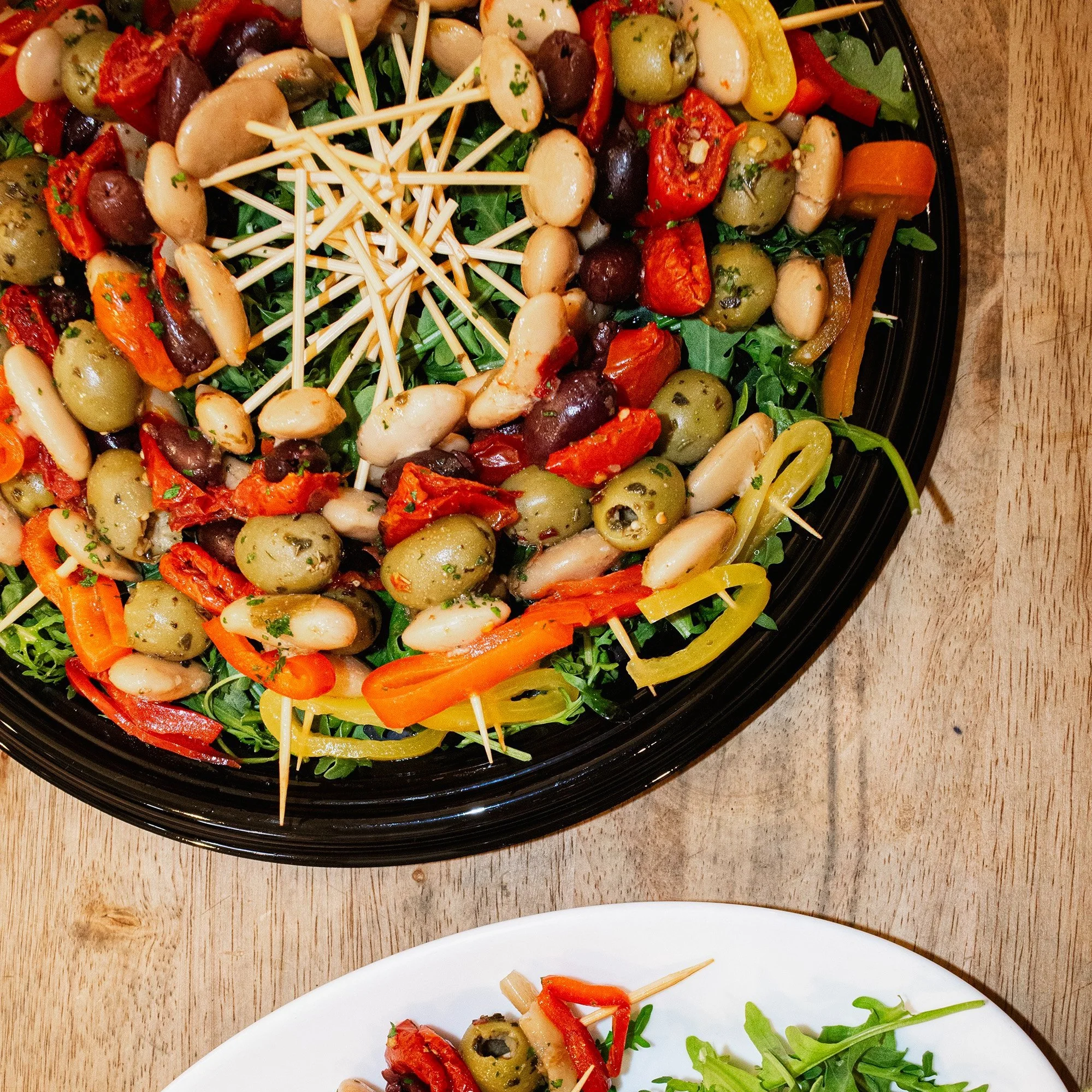 italian vegan bean pepper olive skewers catered for a dinner party