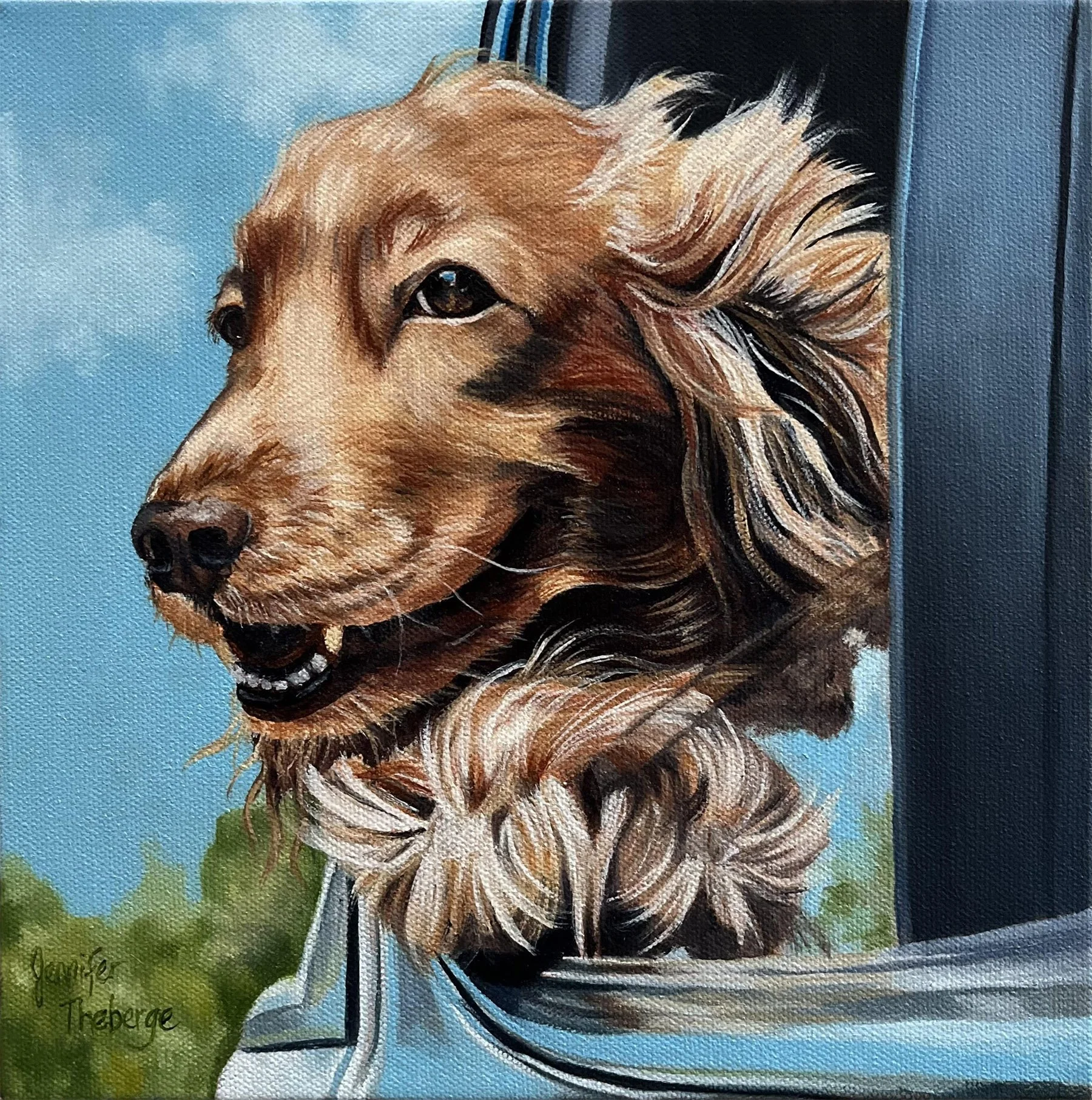 Golden Retreiver out car window