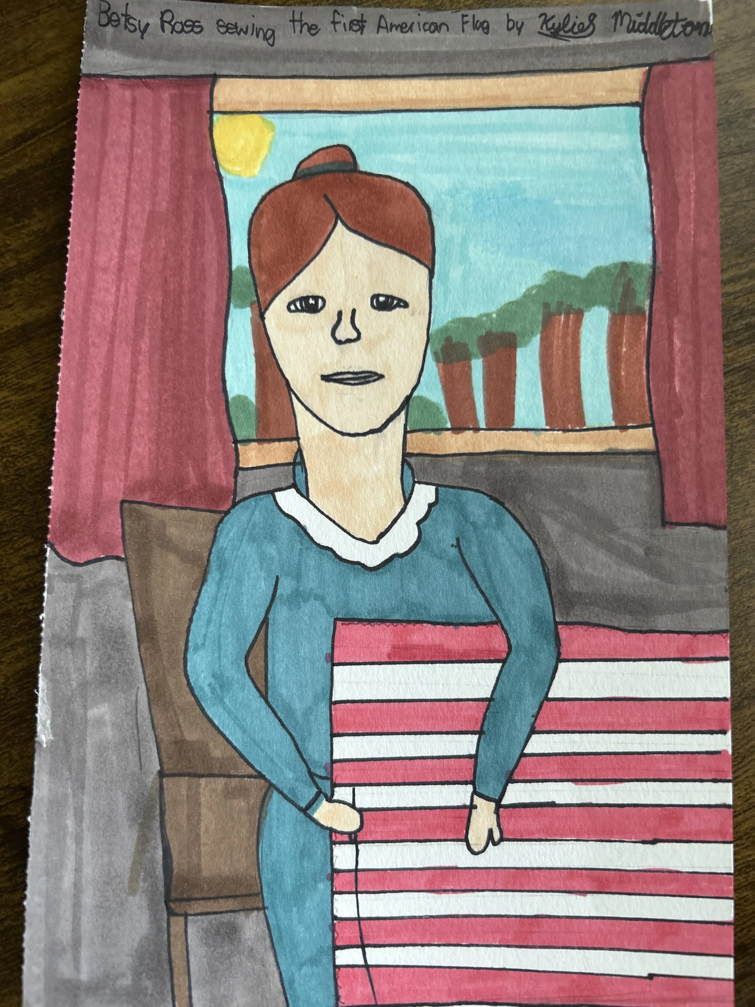 Kylie Middleton from Florence, Texas, drew this picture of Betsy Ross sewing an American flag.
