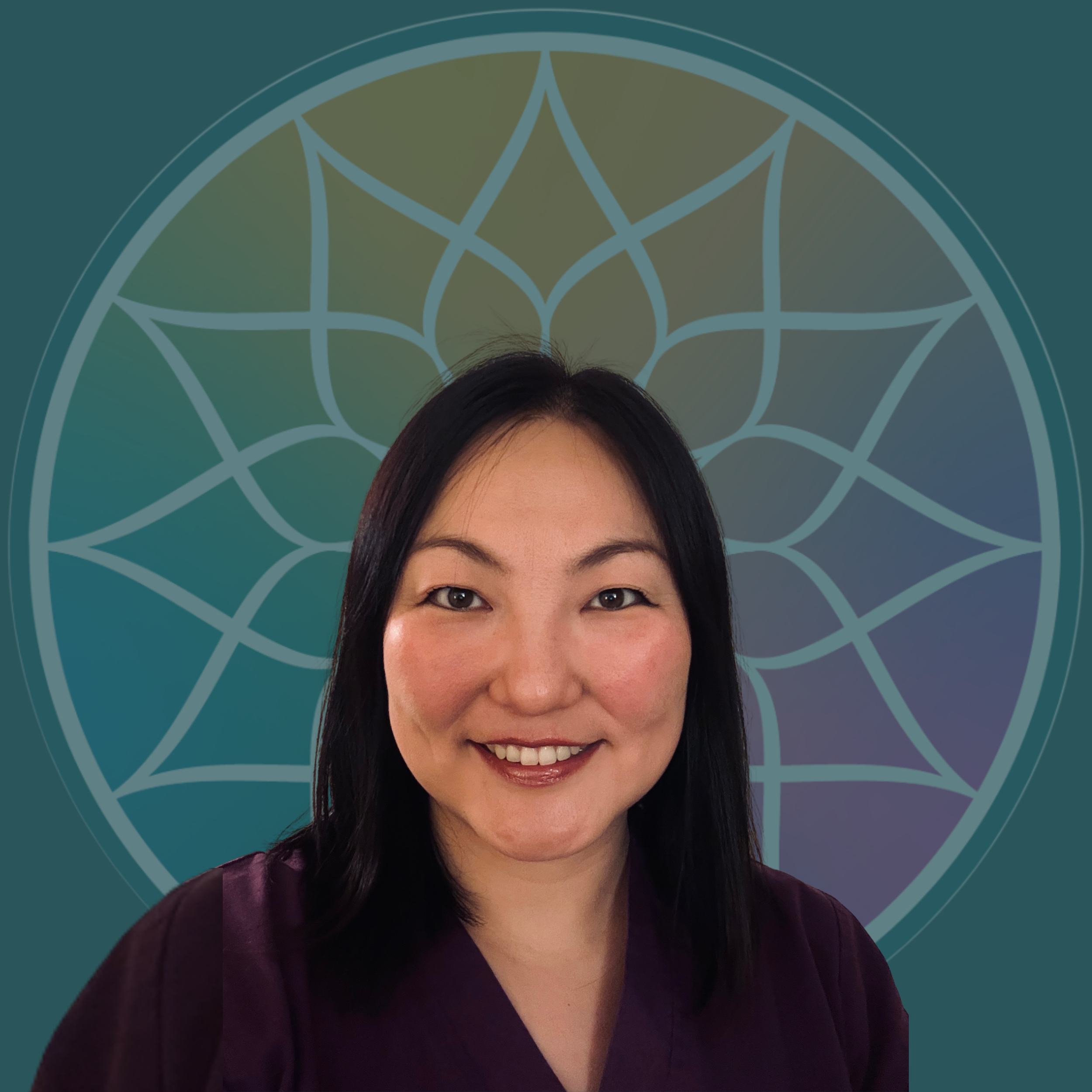 A smiling woman with shoulder-length black hair, wearing a dark-colored top, standing in front of a digital geometric background featuring a mandala-like pattern.