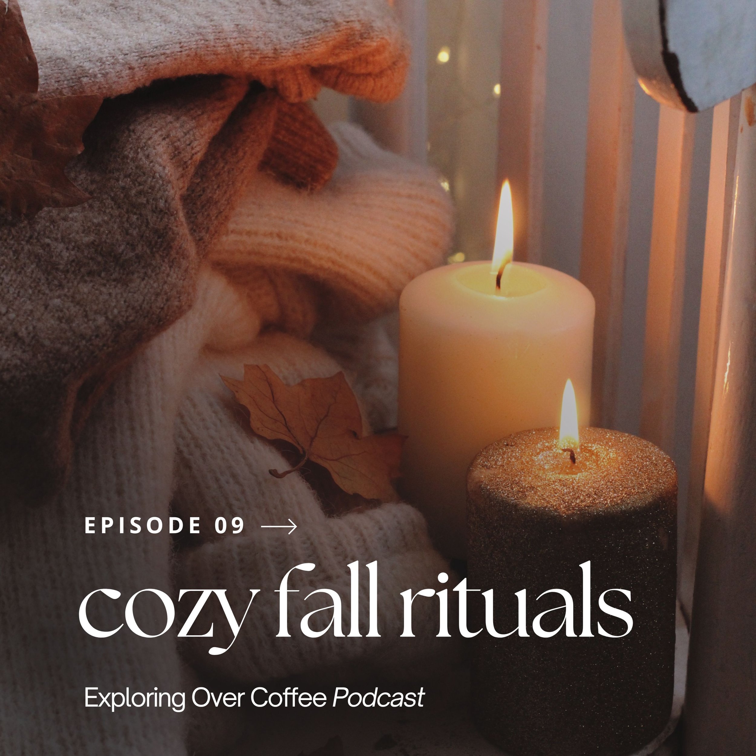 Fall candles, leaves, and sweaters on a chair.