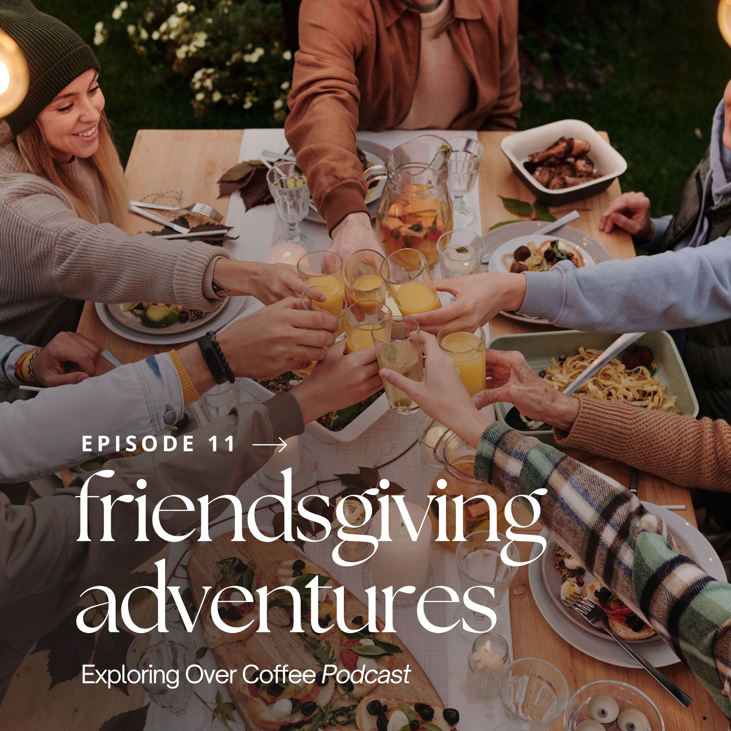 Friends clinking glasses over their dinner table