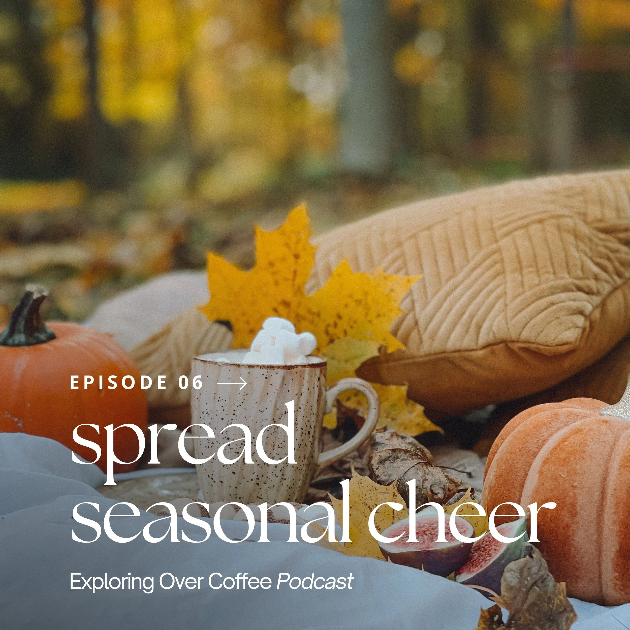 Blanket spread of pillows, pumpkins, figs, leaves, and a mug in a forest