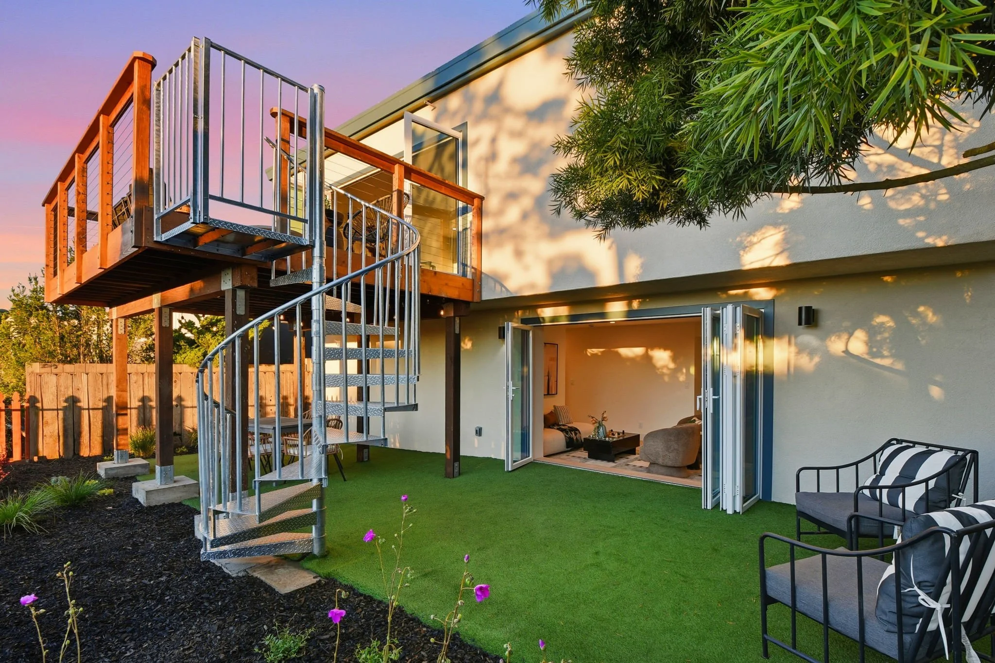 View of backyard and deck at twilight 75 Knollview Way
