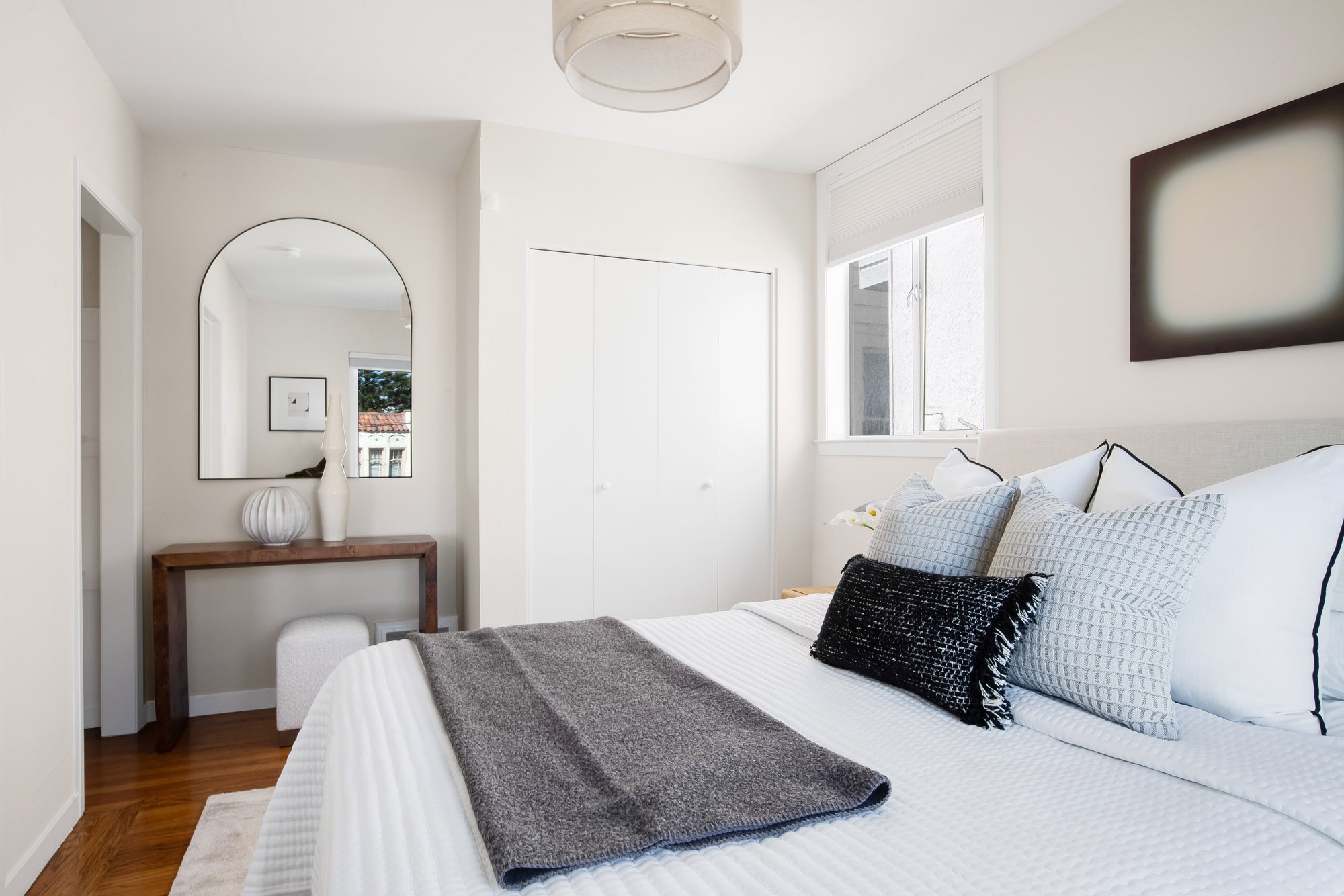 Bedroom at 465 30th Street, San Francisco, with a double closet, two windows and hardwood floors