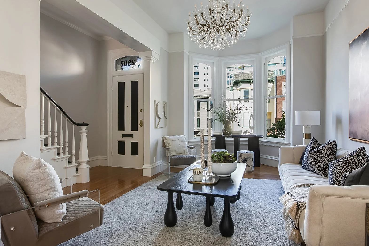 Wide-angle view of an open-concept living space in a luxury home, highlighting the elegant proportions and premium finishes of a Pacific Heights property.