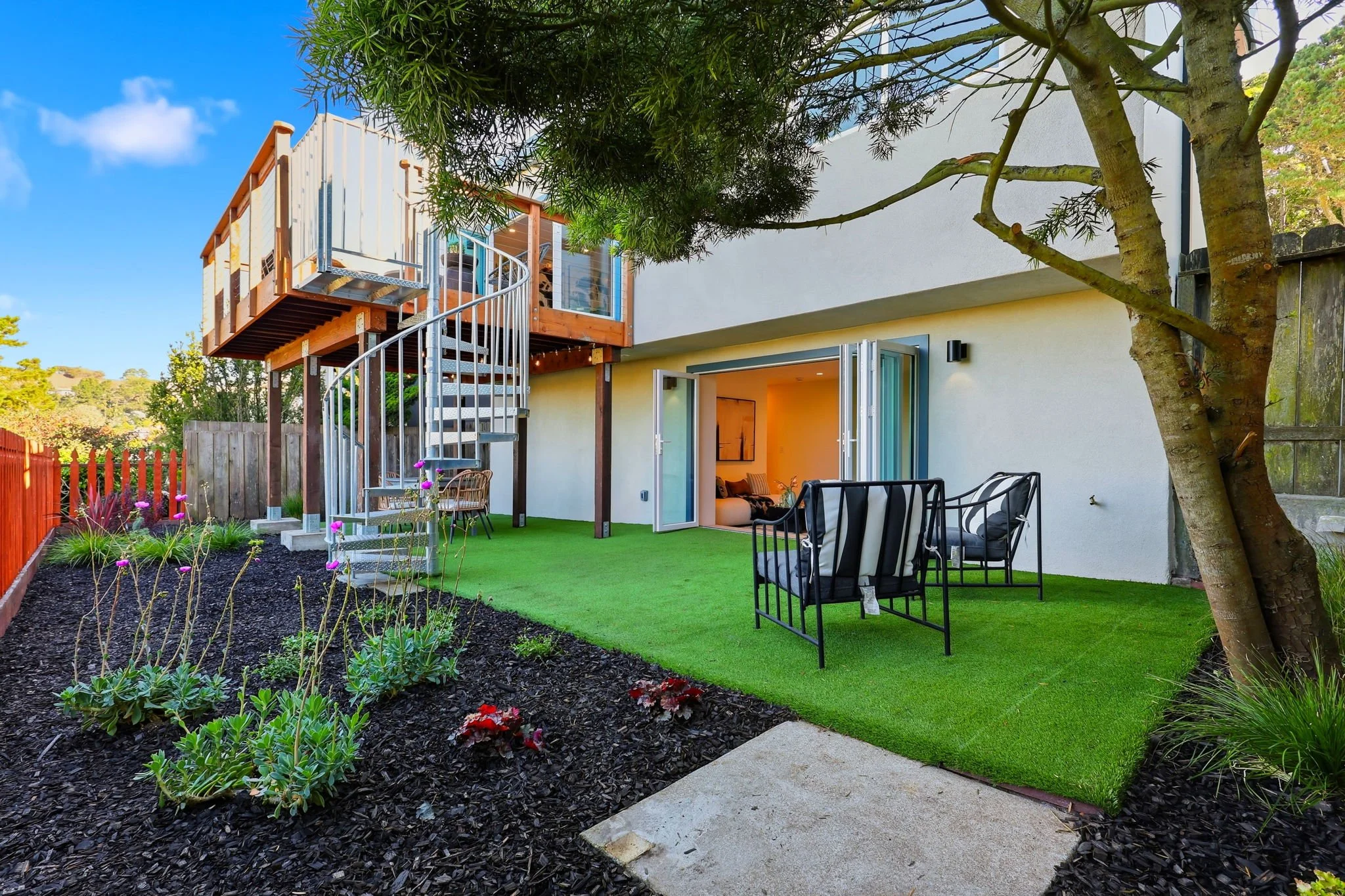 View of 75 Knollview Way backyard and deck 